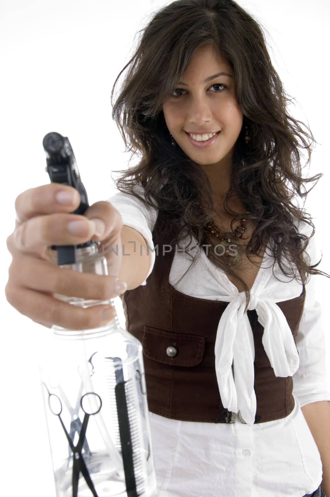 young stylist with spray bottle against white background
