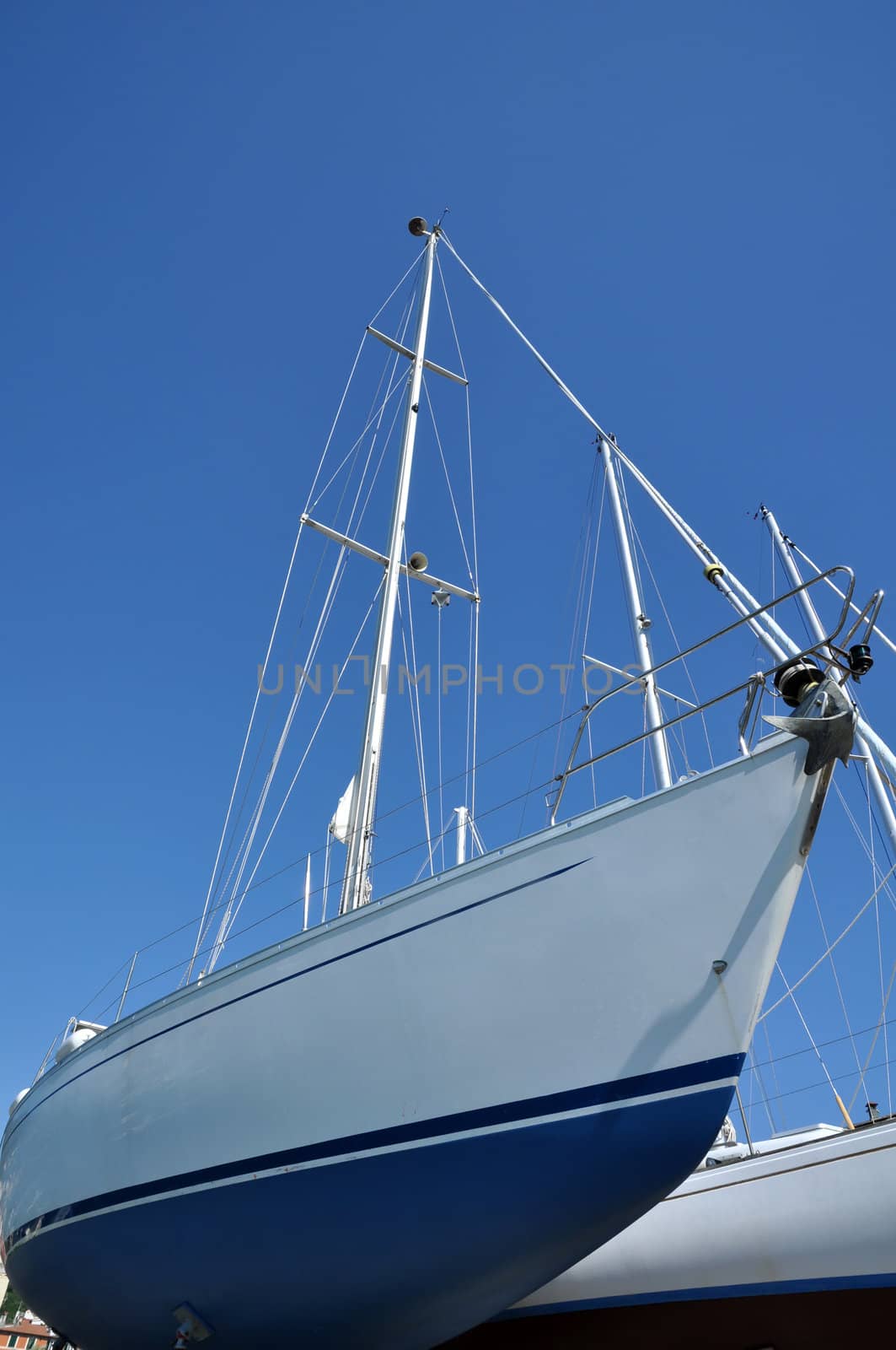 sailboats in a dockyard