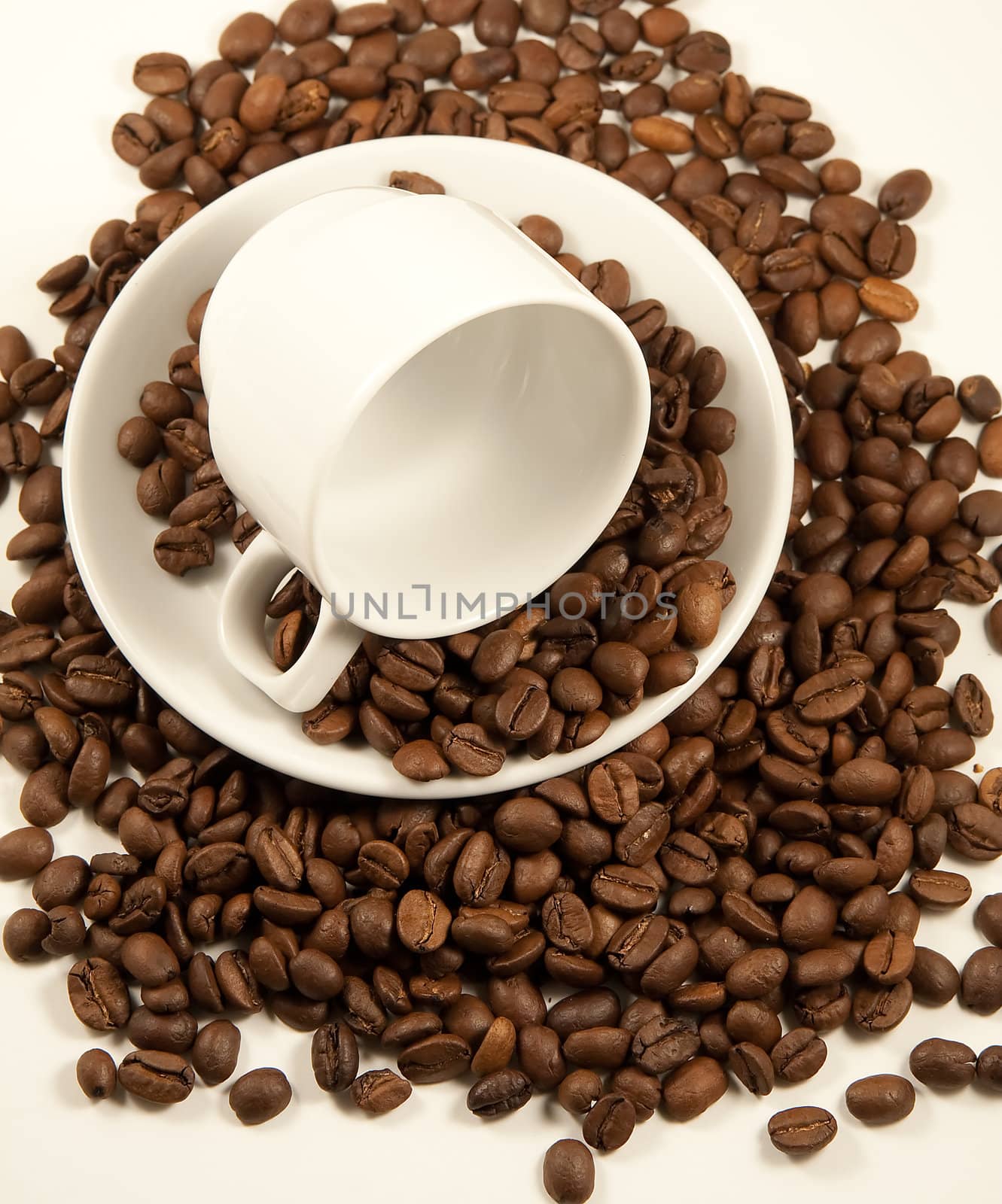 China coffee cup on roasted beans by serpl