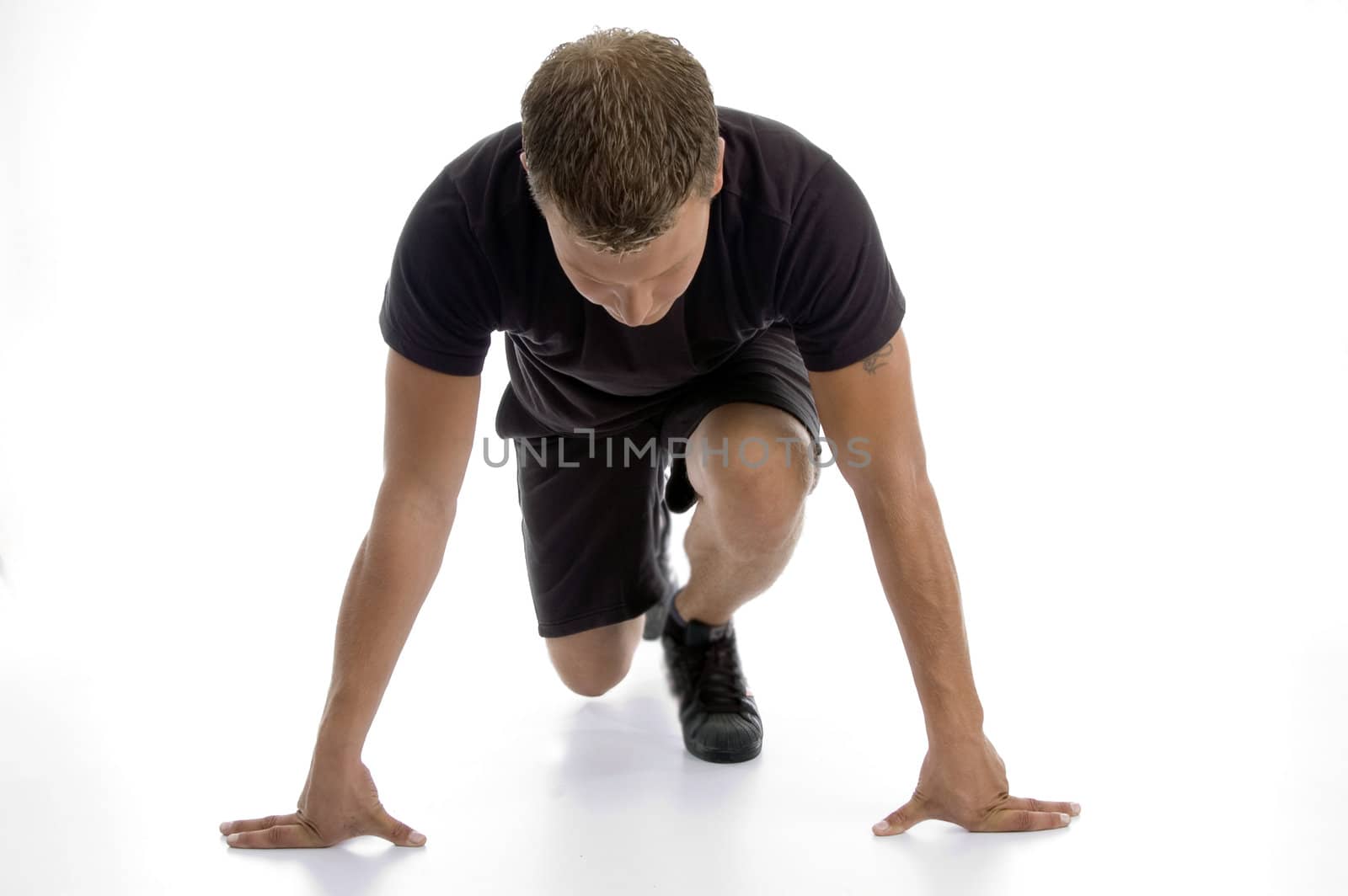 man doing push ups against white background