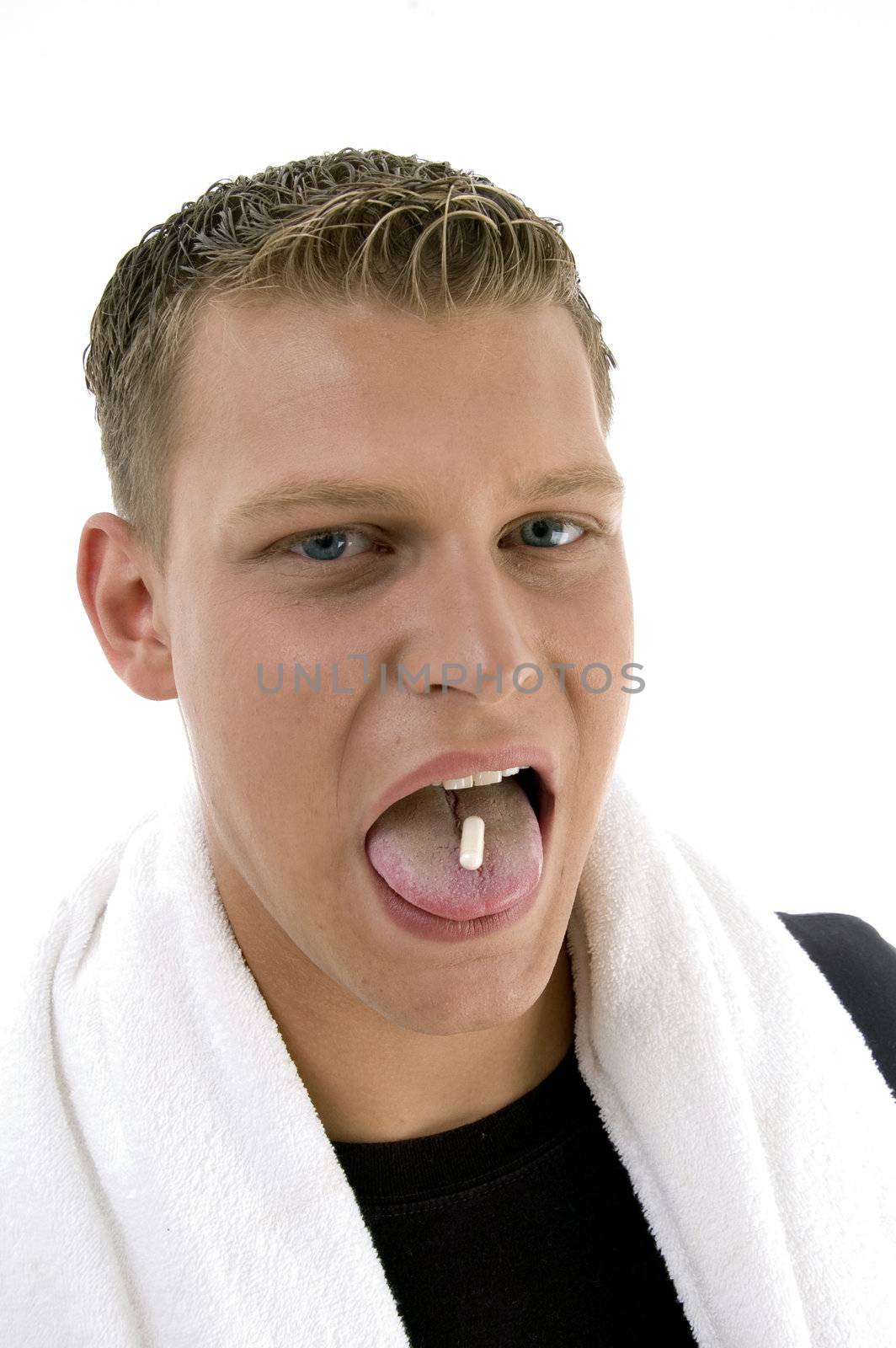 man going to eat capsule on an isolated background