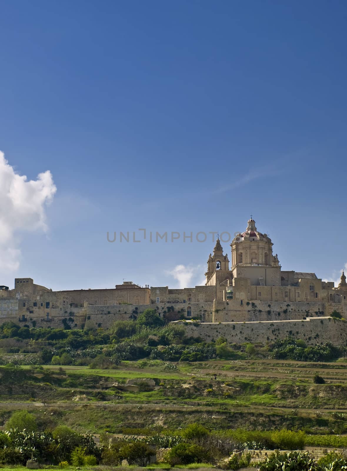 The dome of the medieval cathedral overlooking the bastions of the old city of Malta, Mdina.