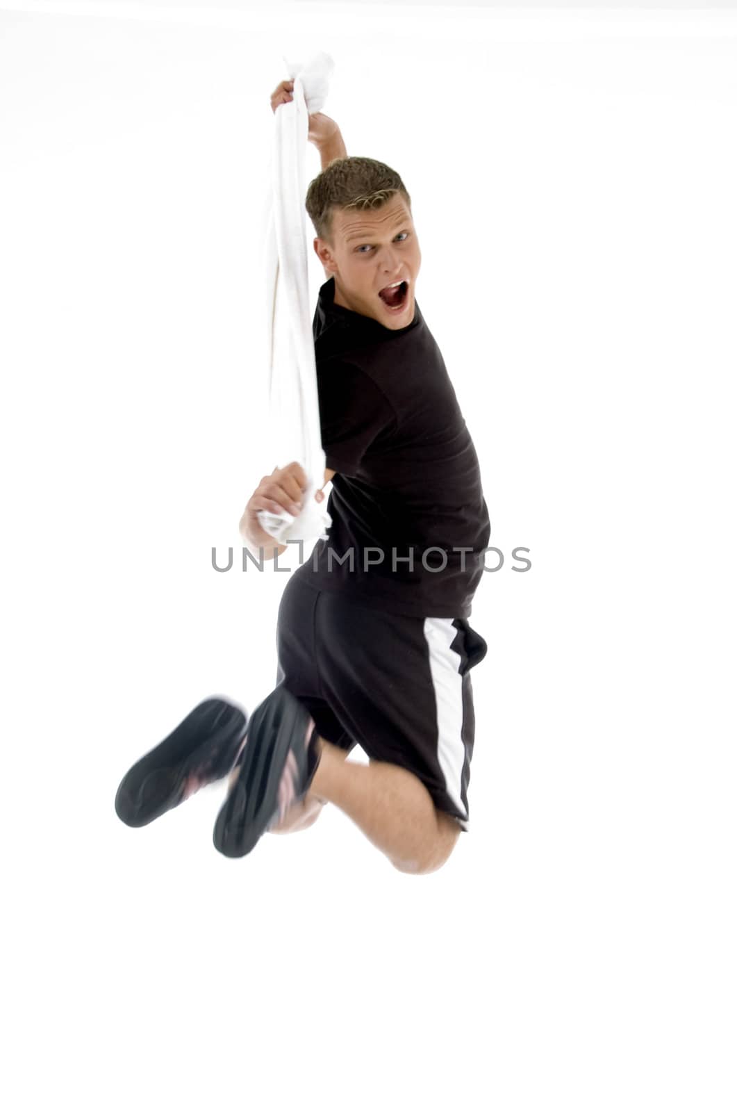 jumping man holding towel against white background