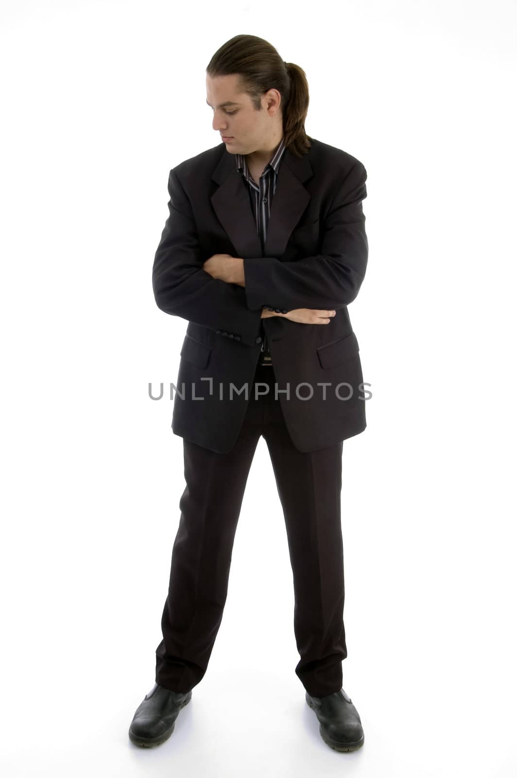 standing businessman with folded hands on an isolated background
