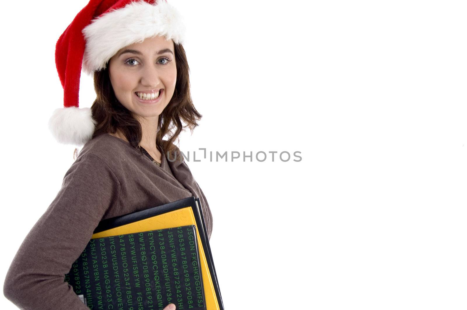 teenager student holding her books on an isolated white background