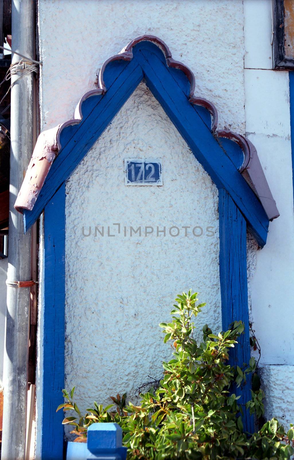 Fragment of a house and its number