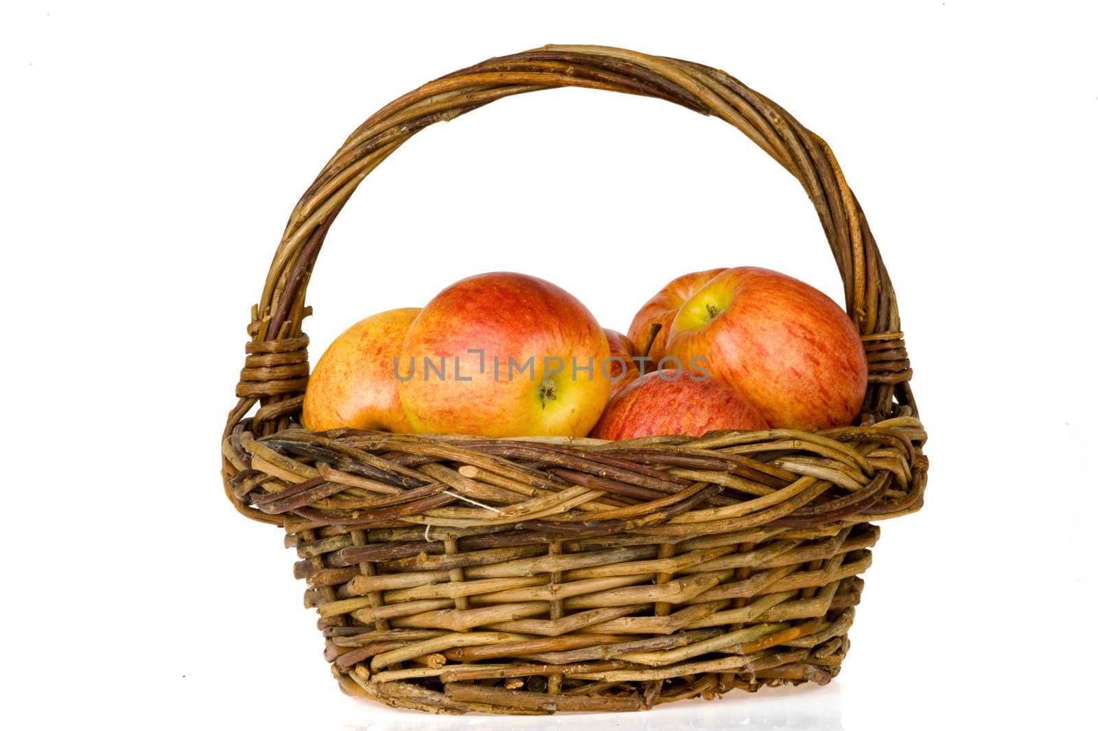 a basket with red apples