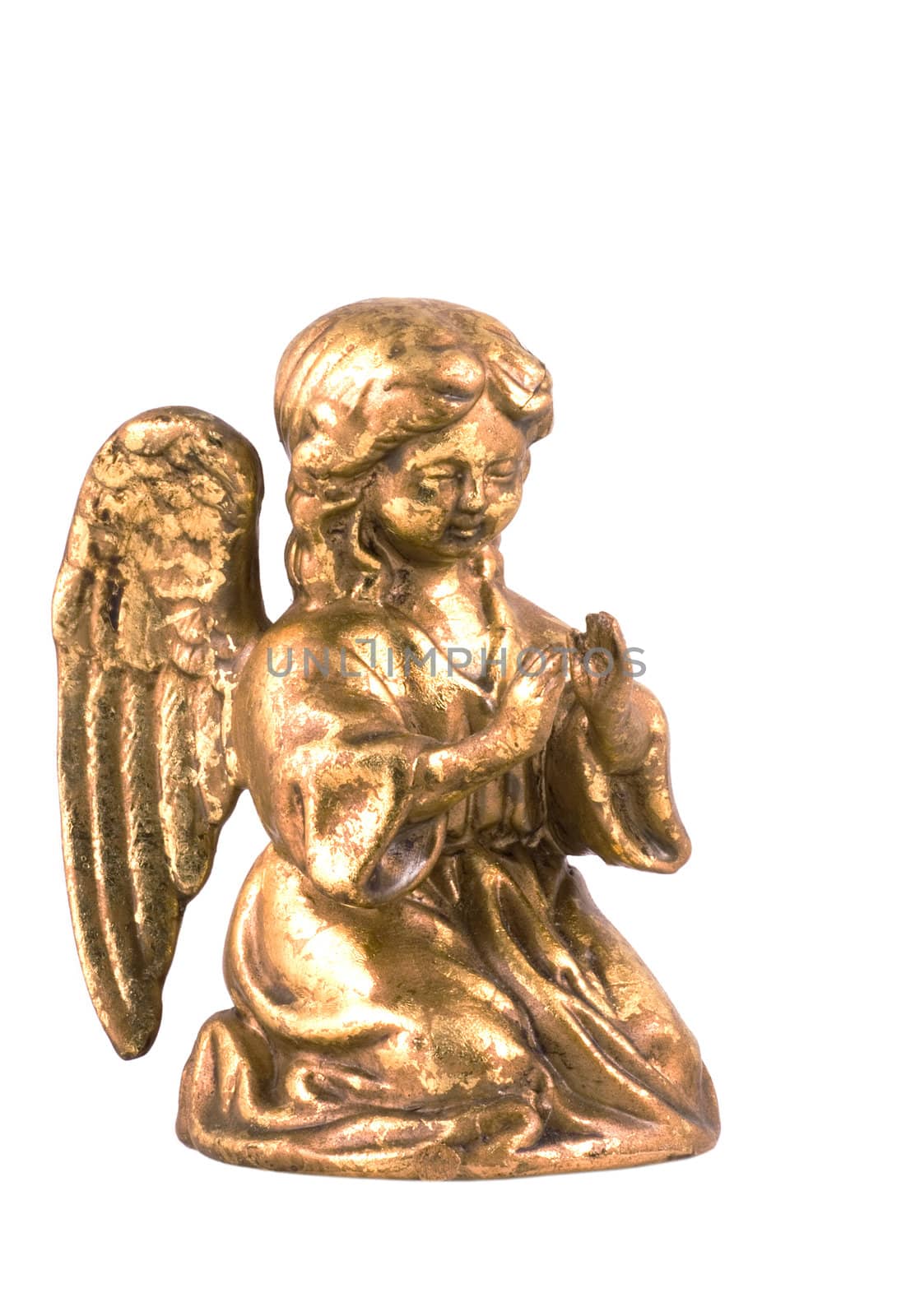 Little golden angel sitting on her knees praying, isolated on white.