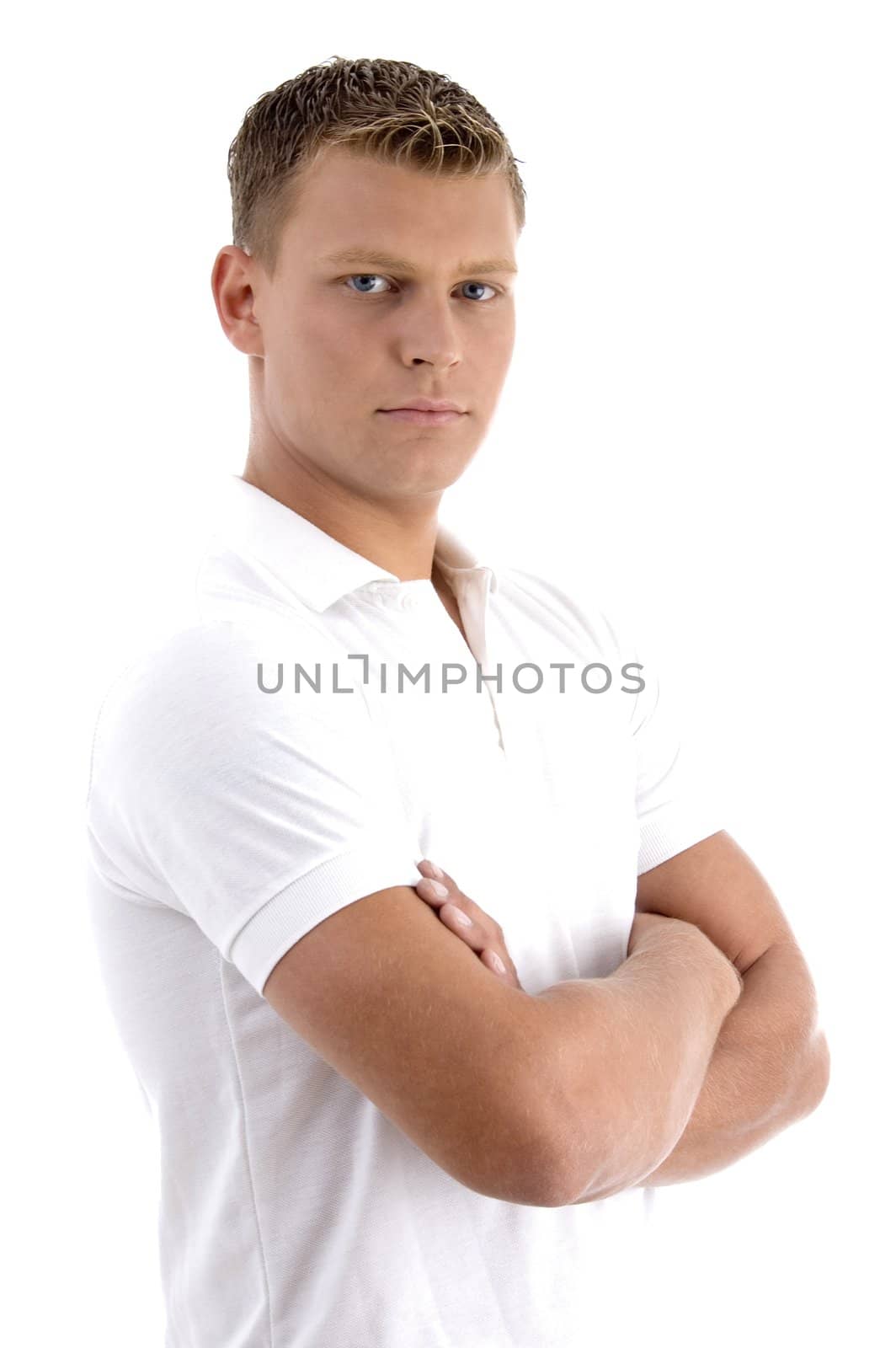 portrait of young man in cool pose on an isolated white background
