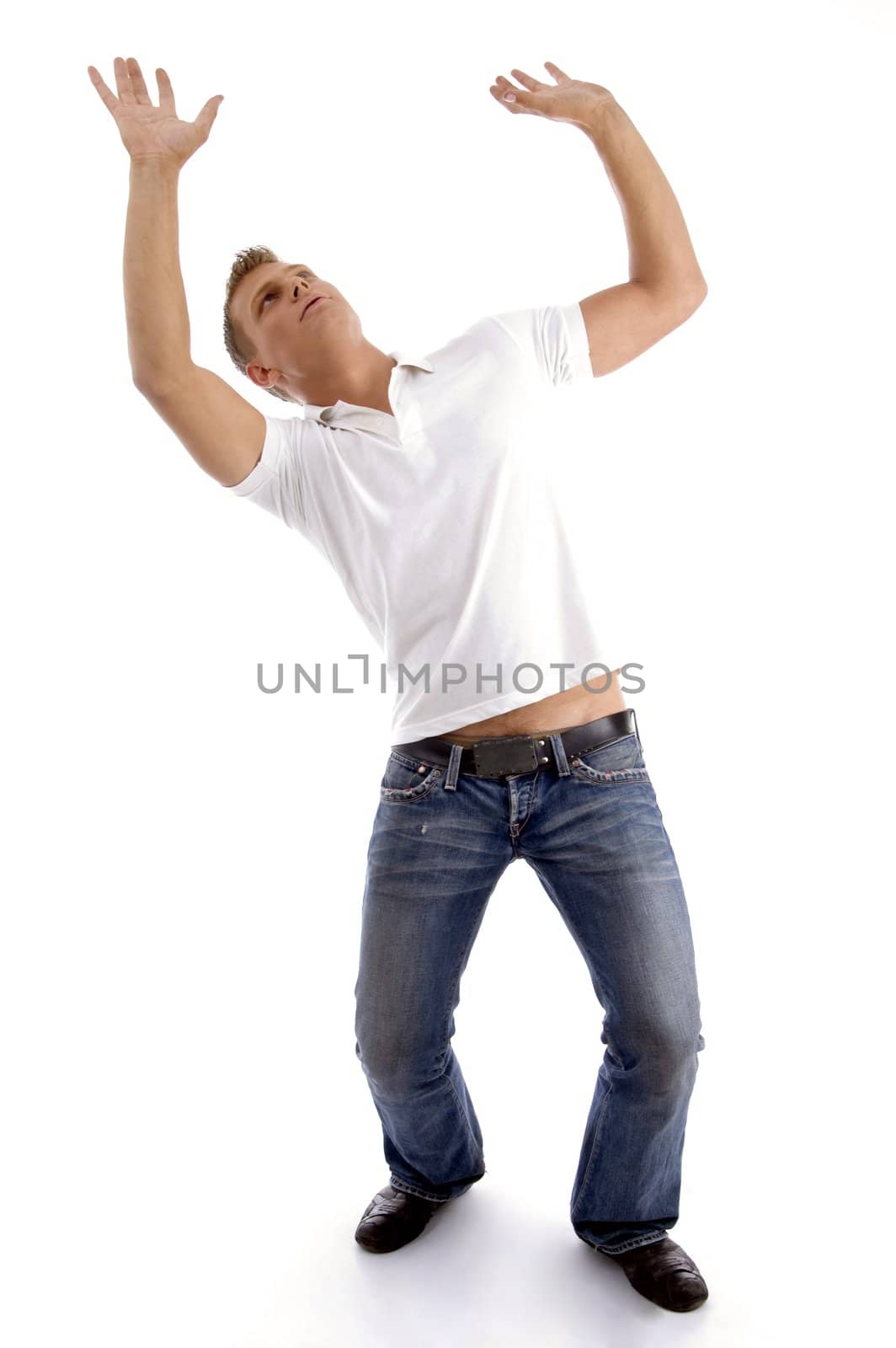 man looking upwards and posing like holding something with white background