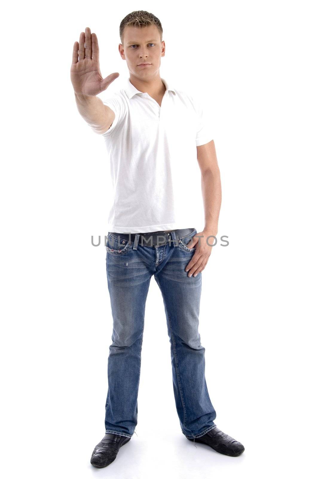 male gesturing stop with his hand isolated on white background