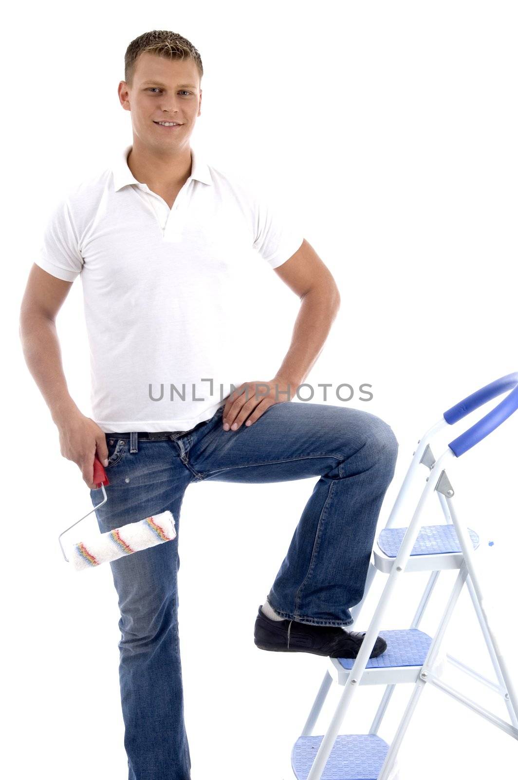 handsome painter standing on ladder chair isolated on white background