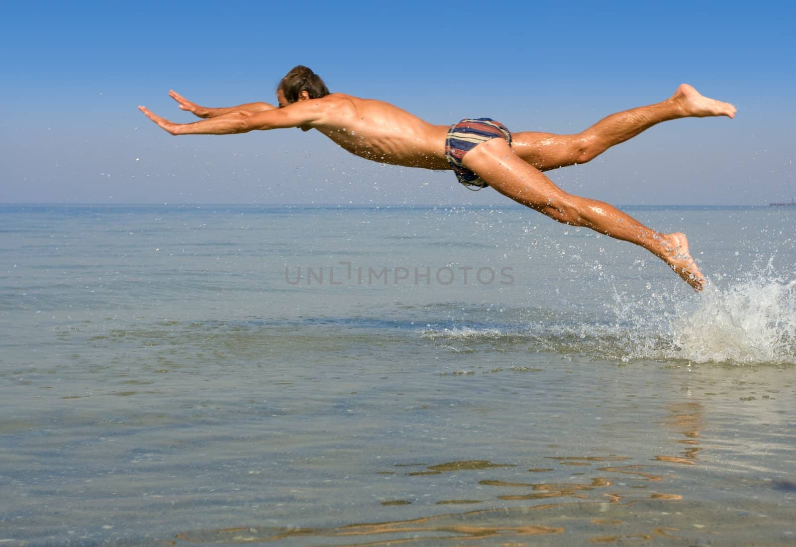 Man fly over sea