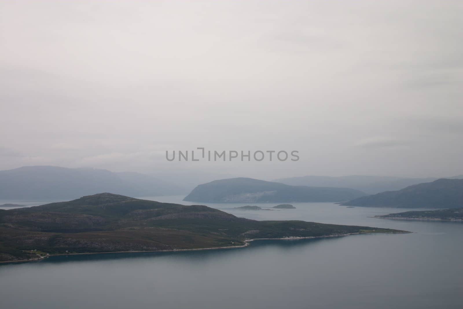 rough north norway landscape with overcast sea