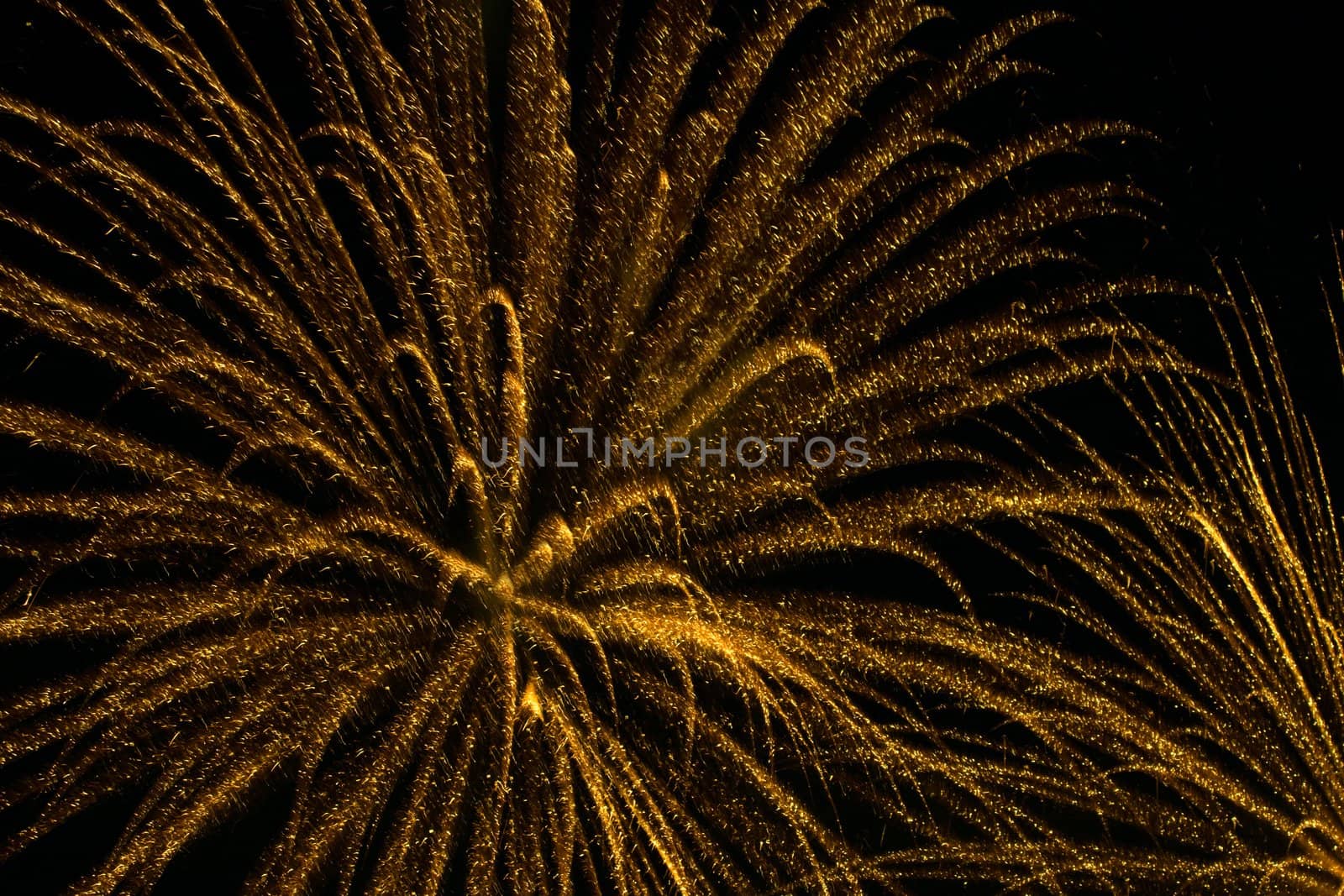 yellow fireworks in black sky