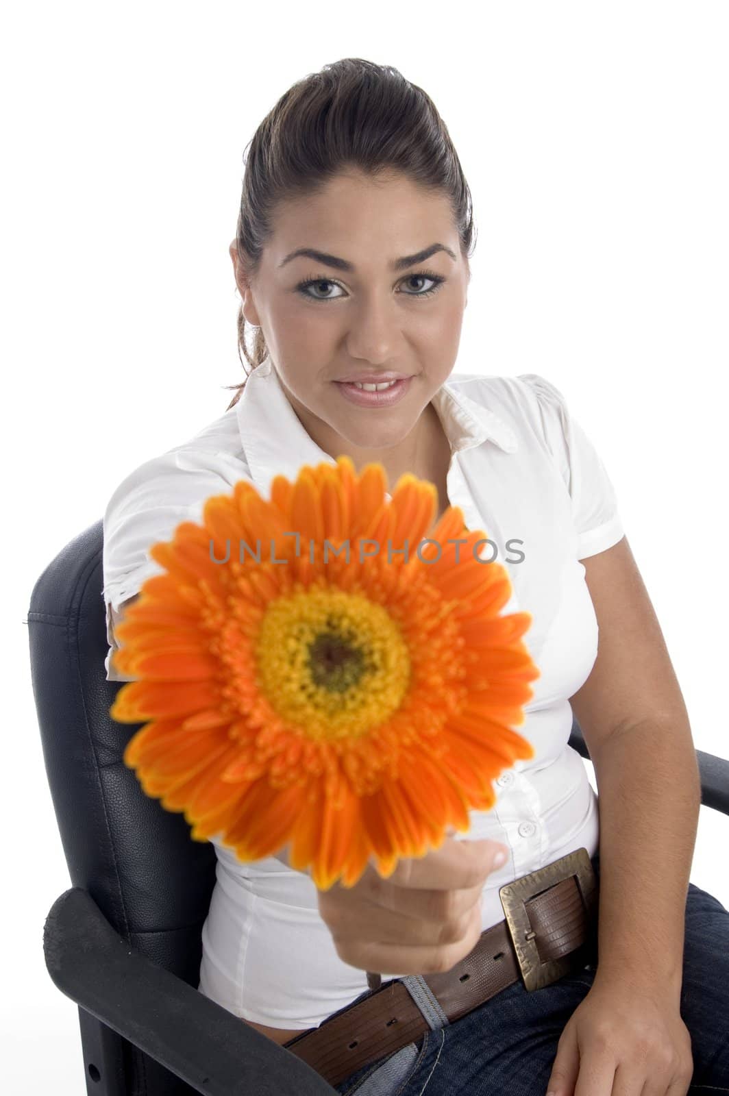 lovely girl showing orange gerbera flower with white background