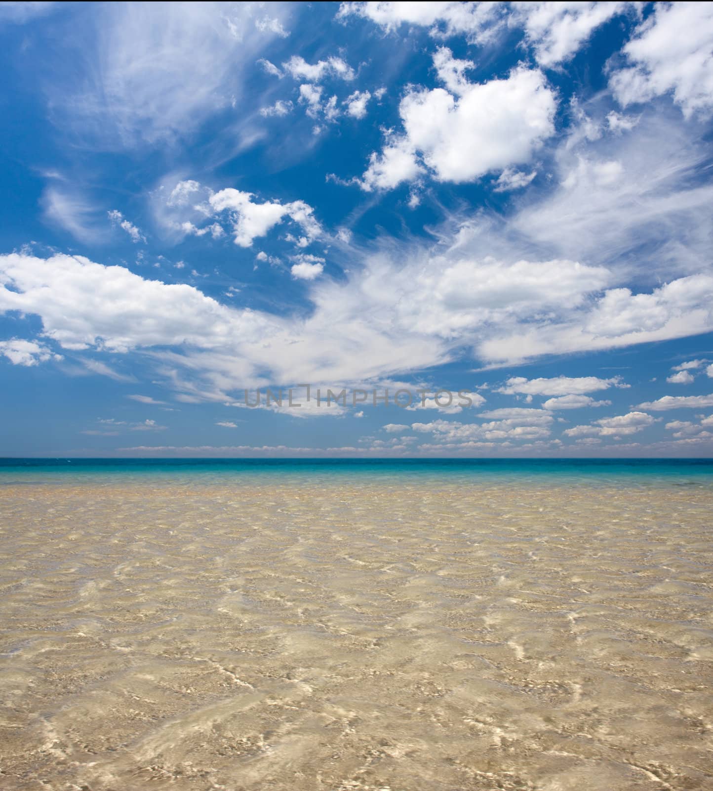 Warm sea and sky with clouds