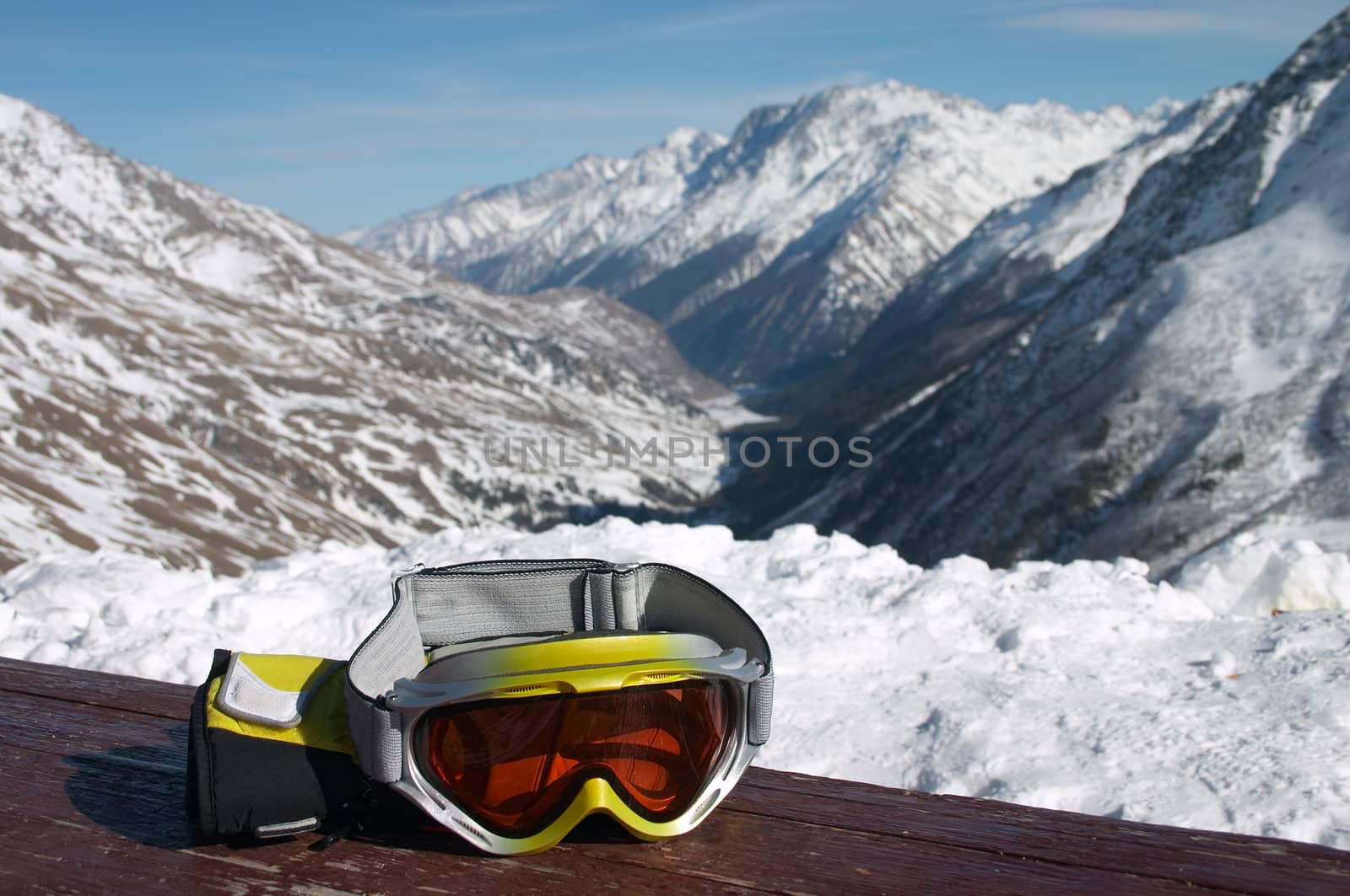 ski goggles on the table in winter mountains