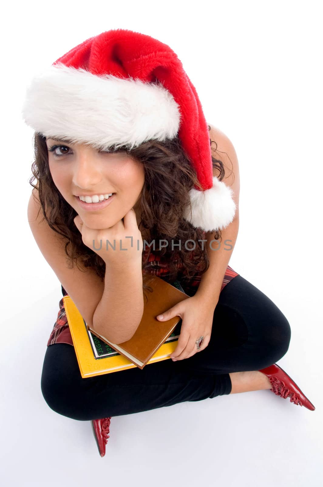 student with christmas hat on an isolated white background