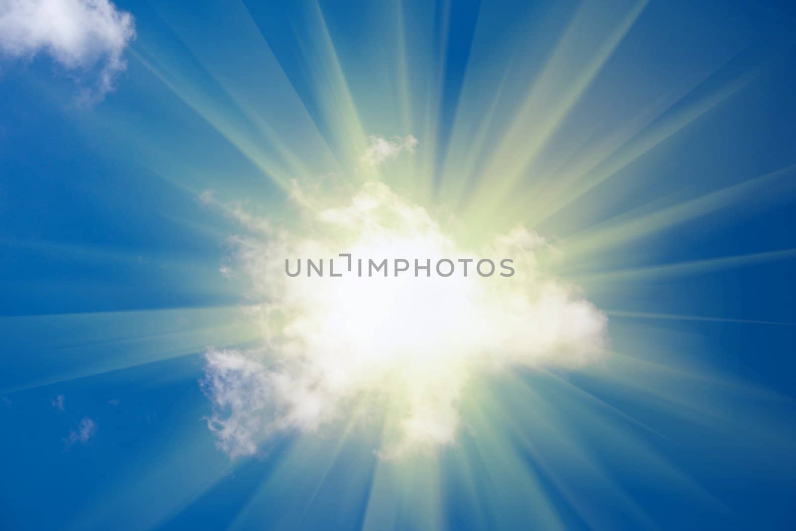 Sun shine from behind cloud on blue sky