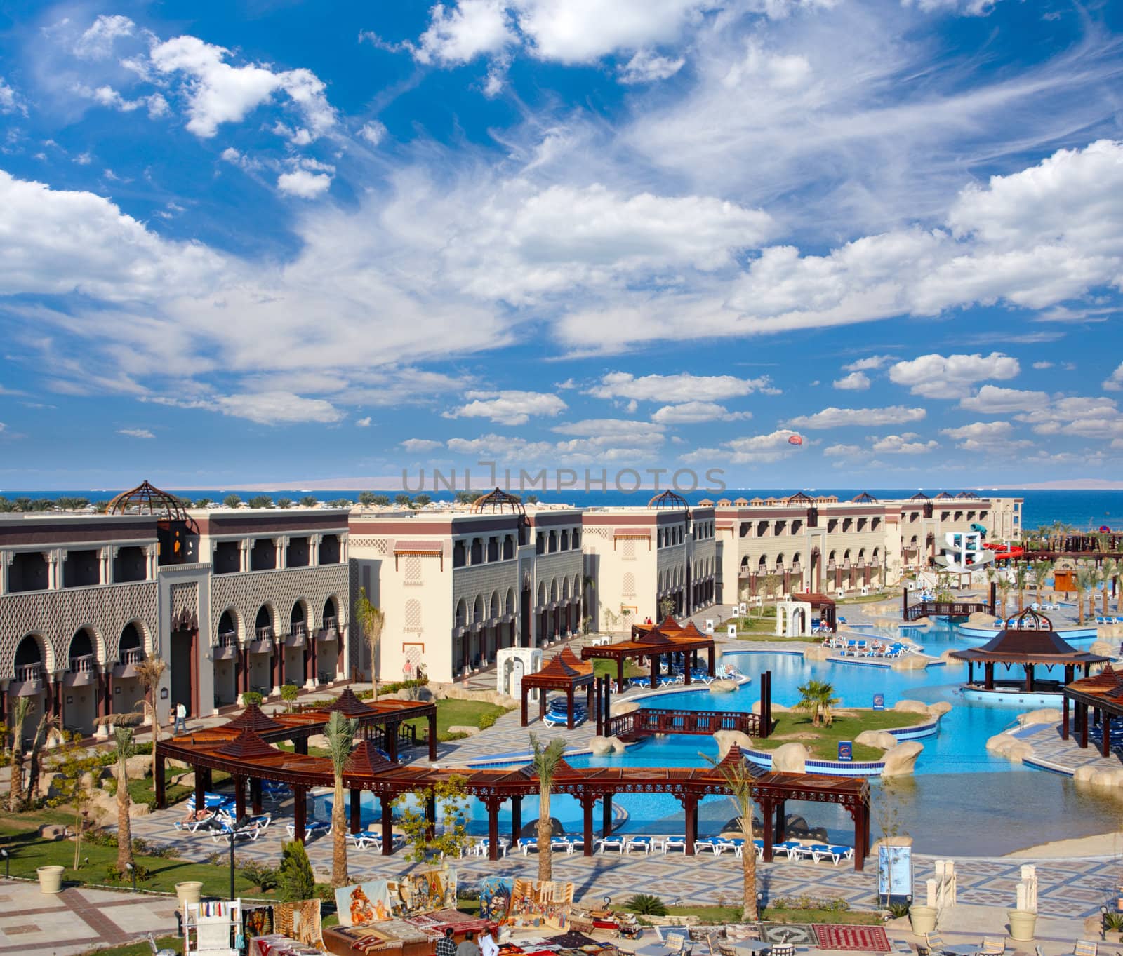 Territory of hotel with swimming pool on the sea coast