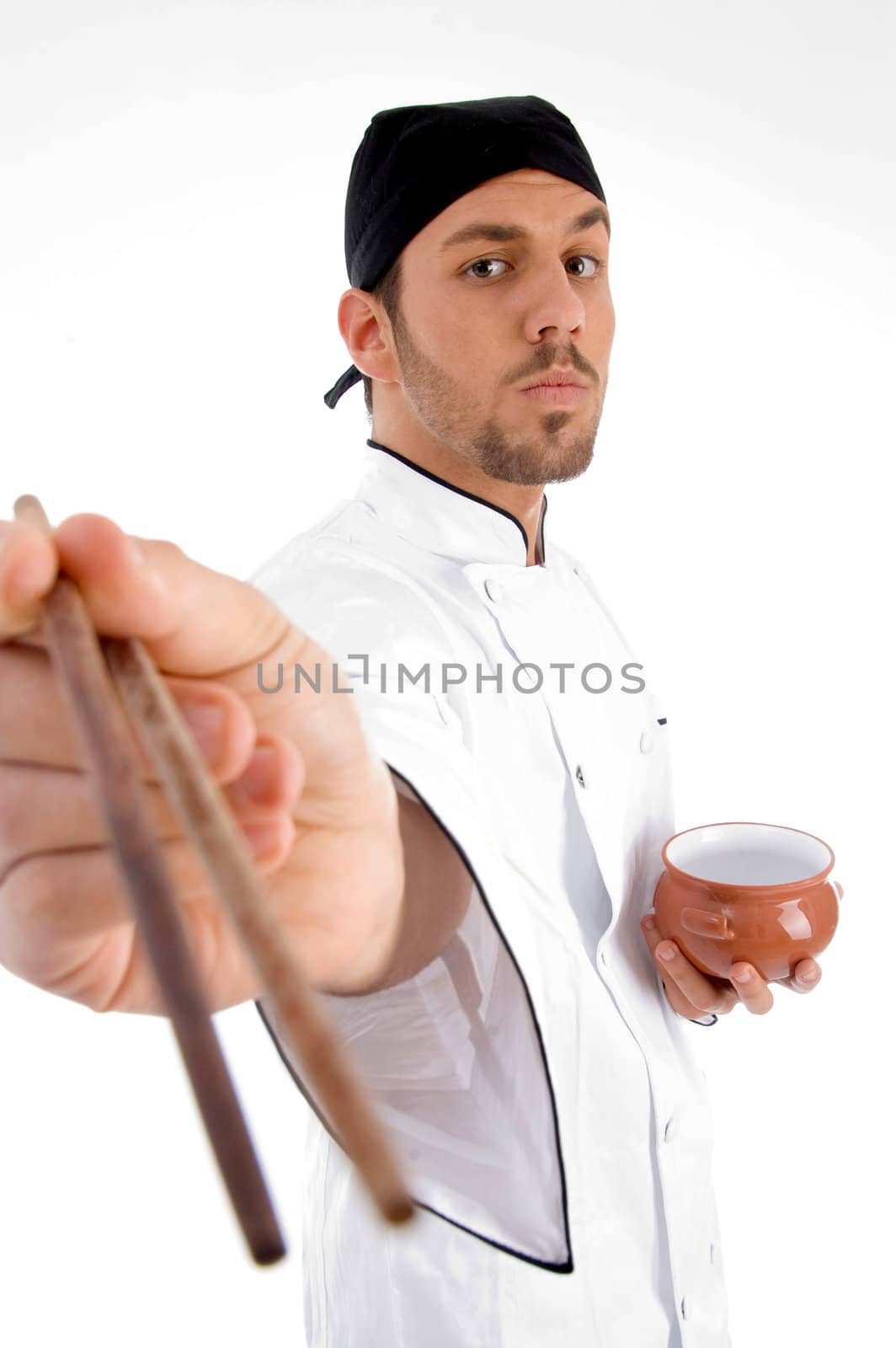 chef with chopsticks and bowl against white background