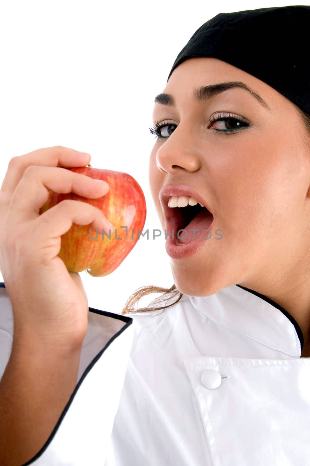 chef going to eat apple on an isolated background