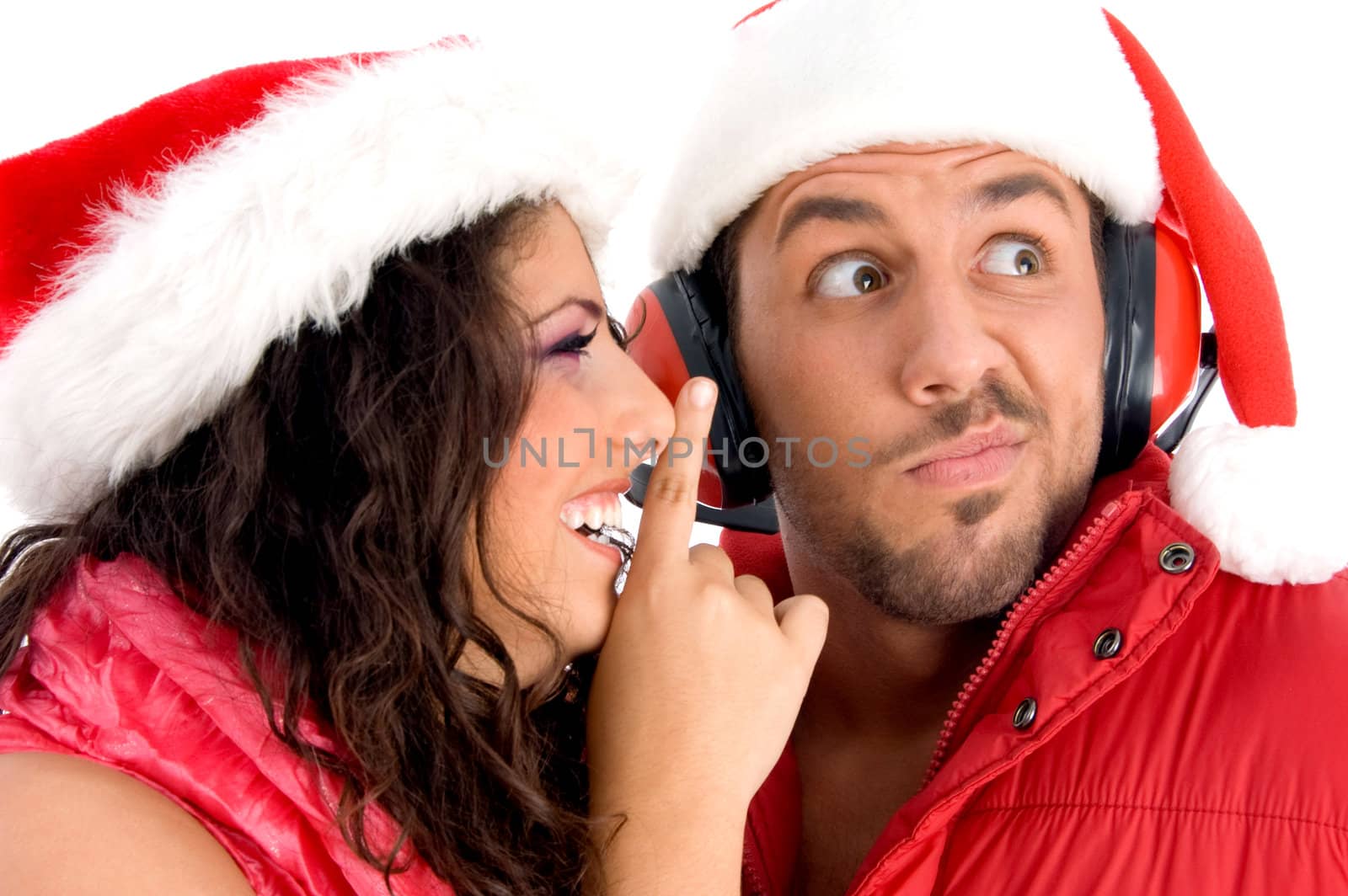 woman asking man to keep silent against white background