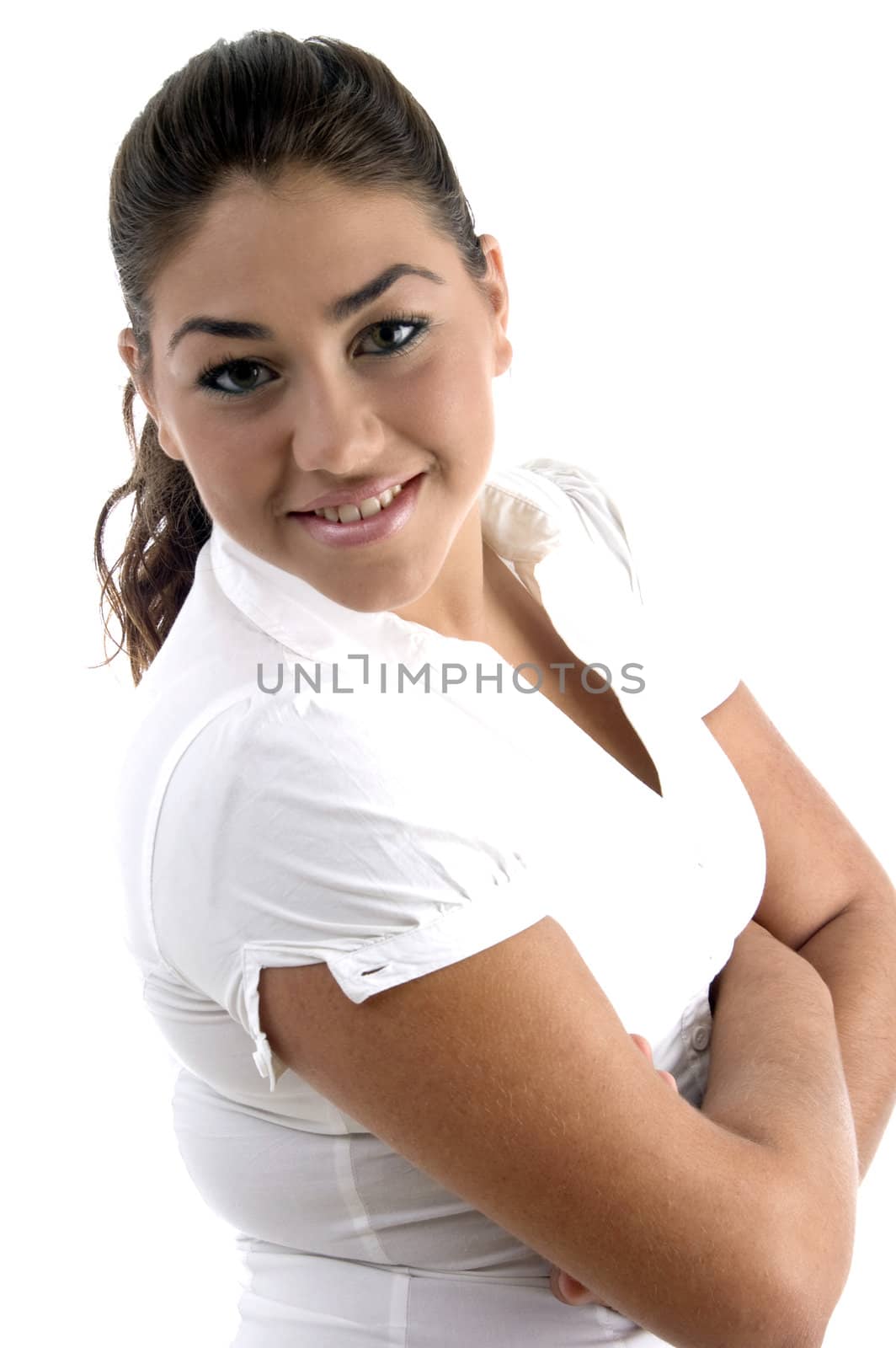 smiling beautiful model with crossed arms on an isolated white background