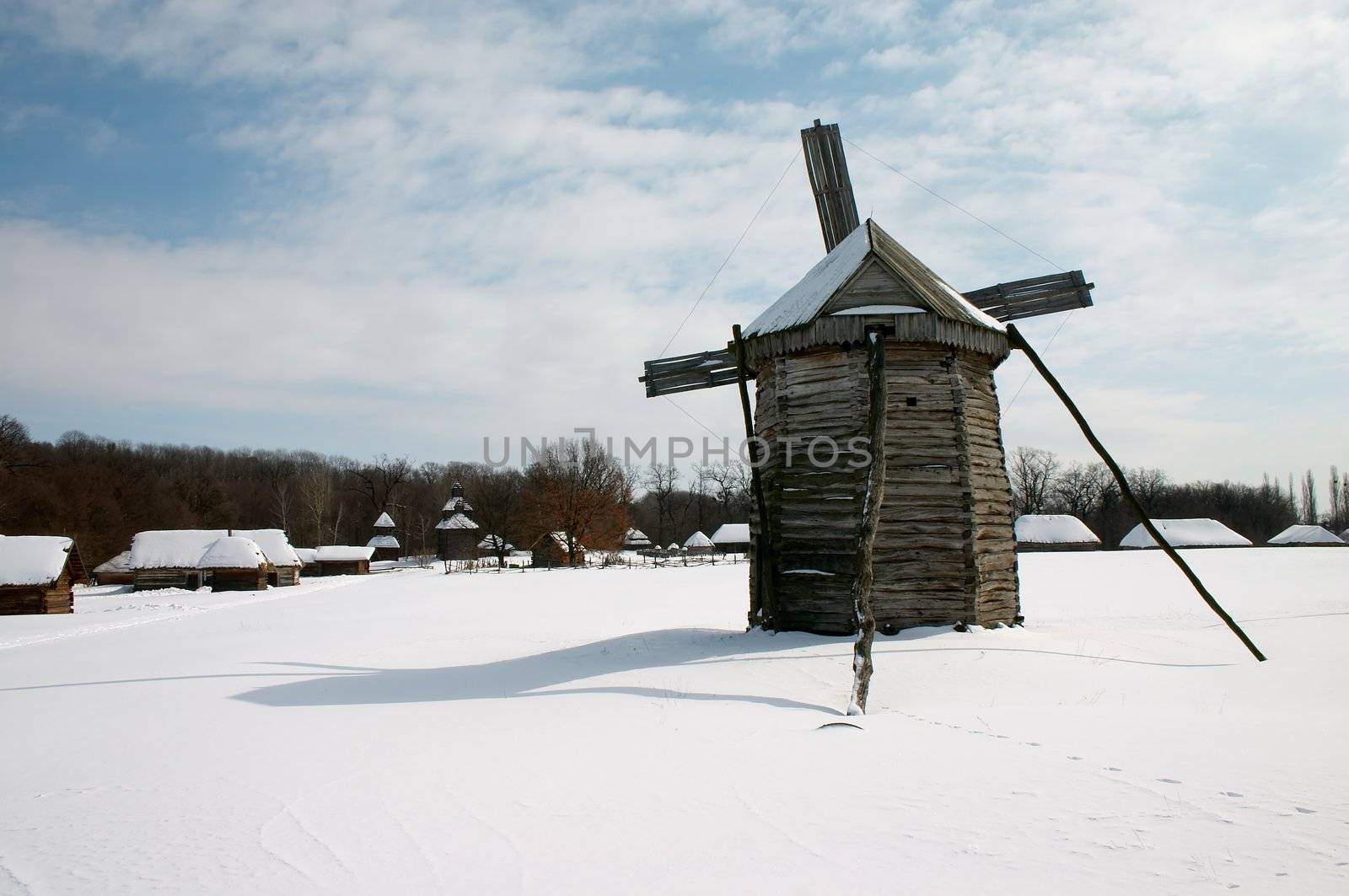 Windmill in the village by Ukrainian