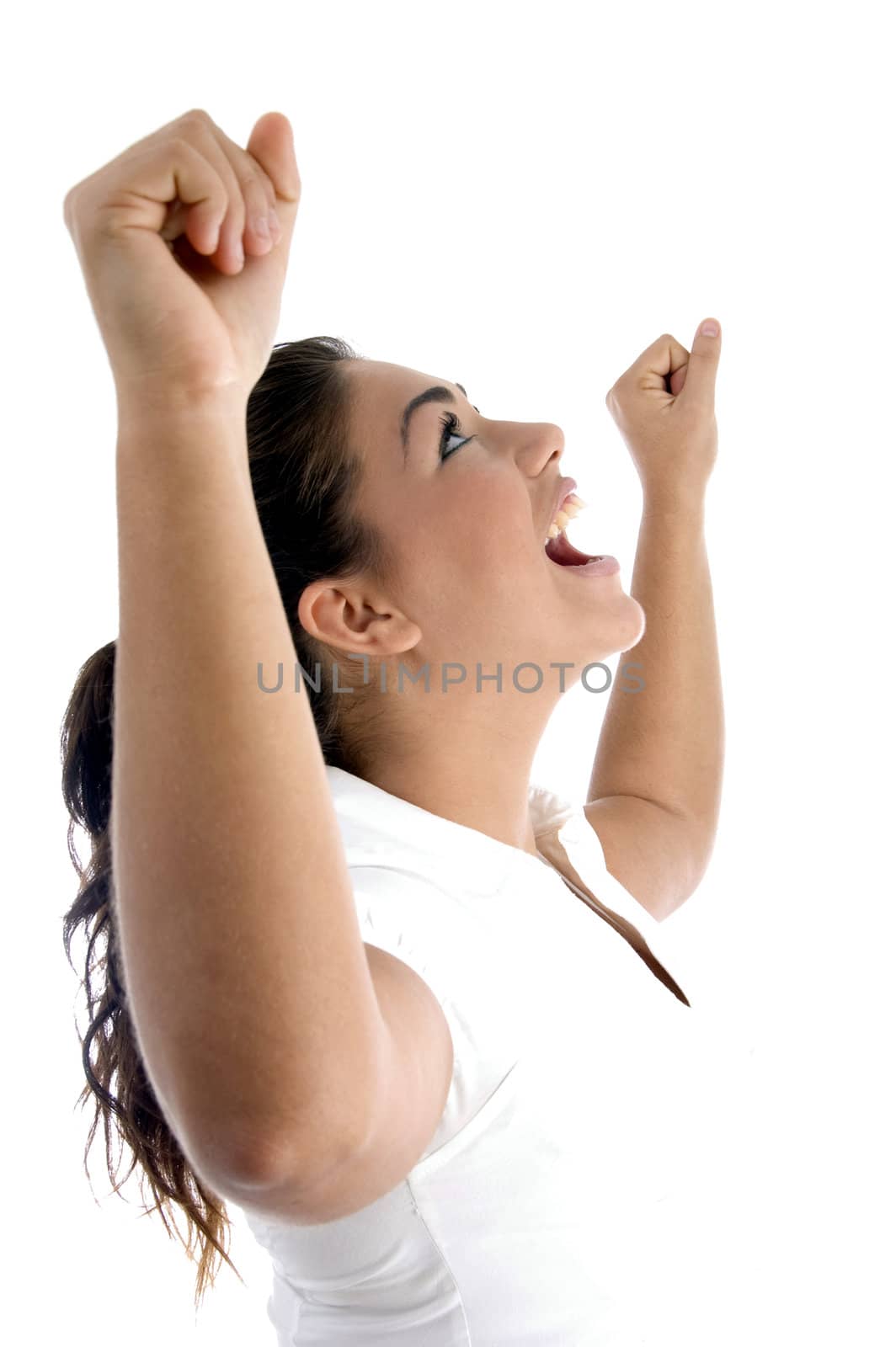 woman showing winning gesture on an isolated white background