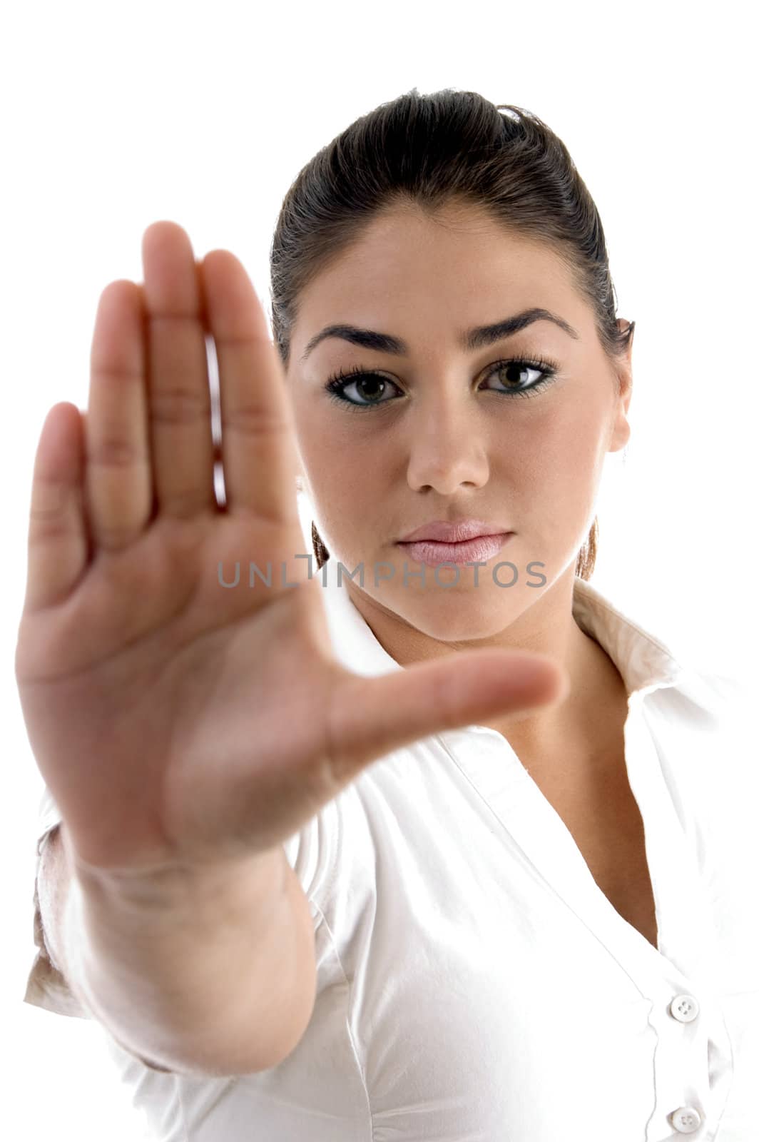 young woman gesturing to stop on an isolated white background