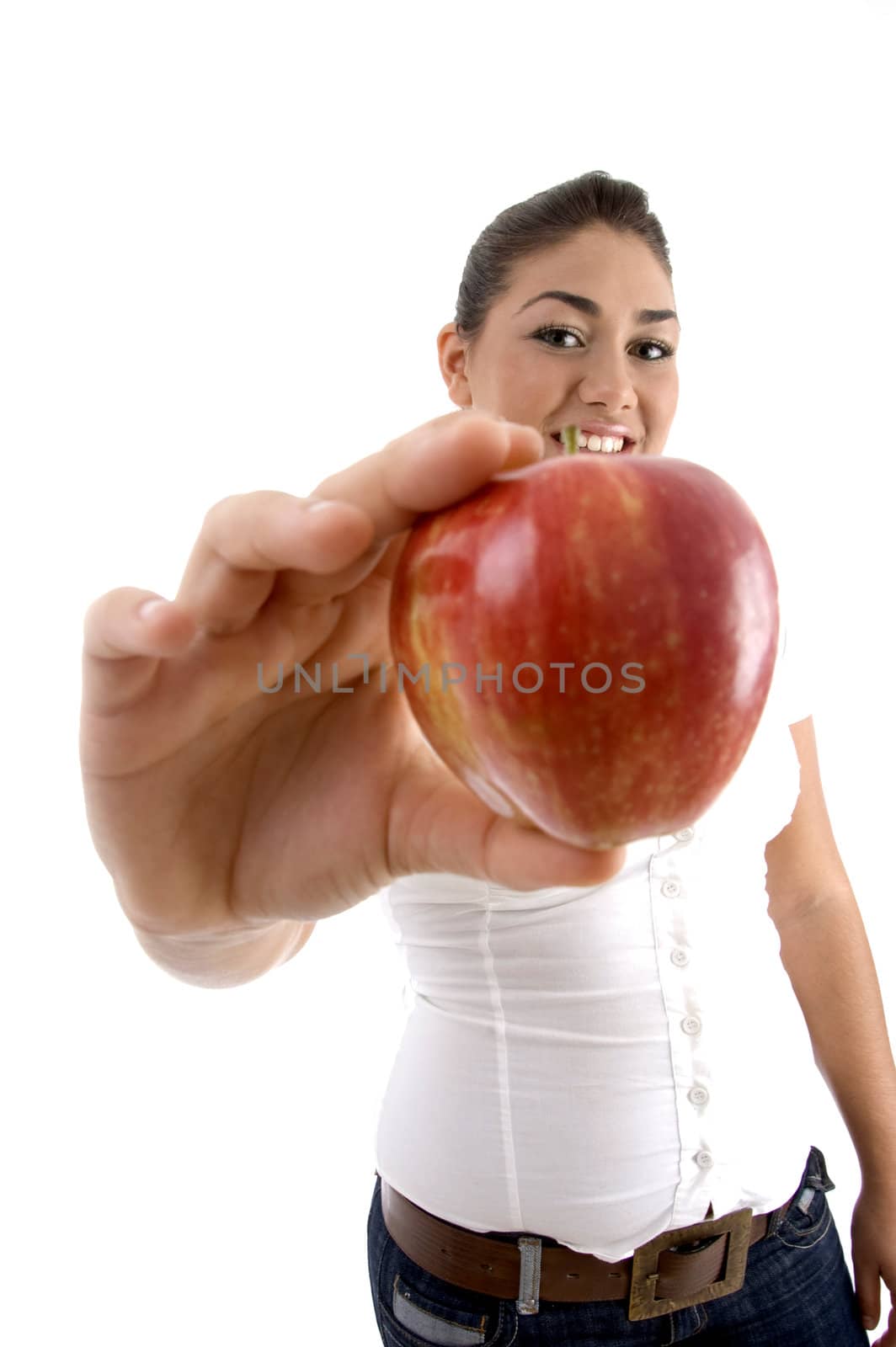 young female showing apple on an isolated background