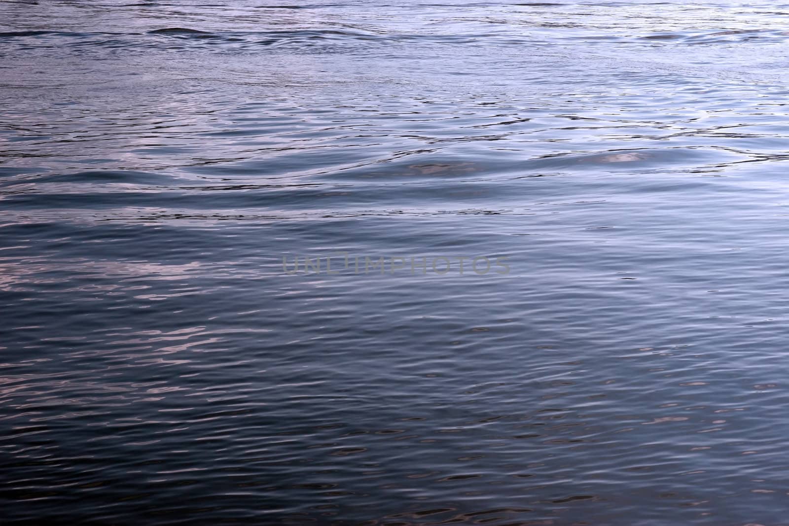 the ripples and wave patterns in the water