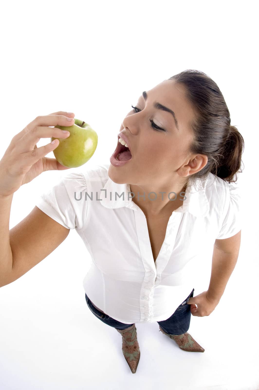 high angle view of standing woman with apple against white background
