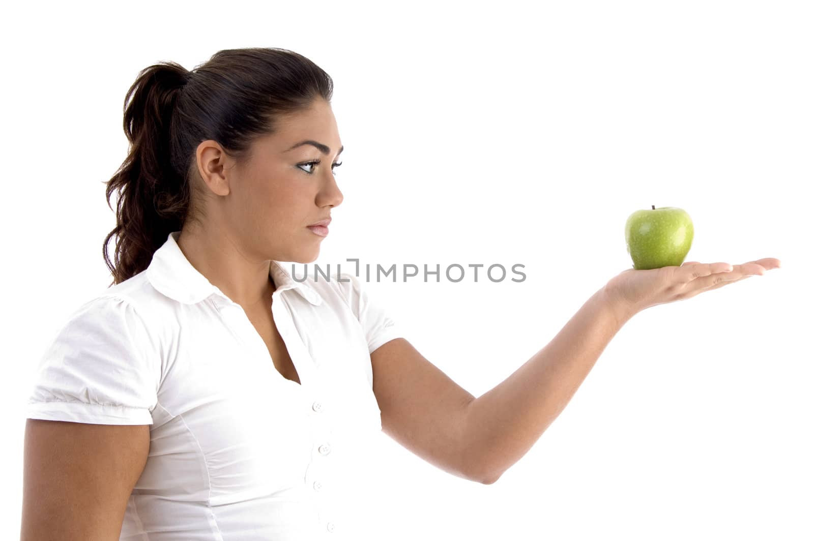 woman looking the apple with white background