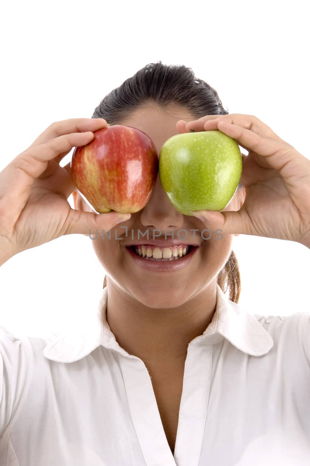 woman posing with apples on an isolated background