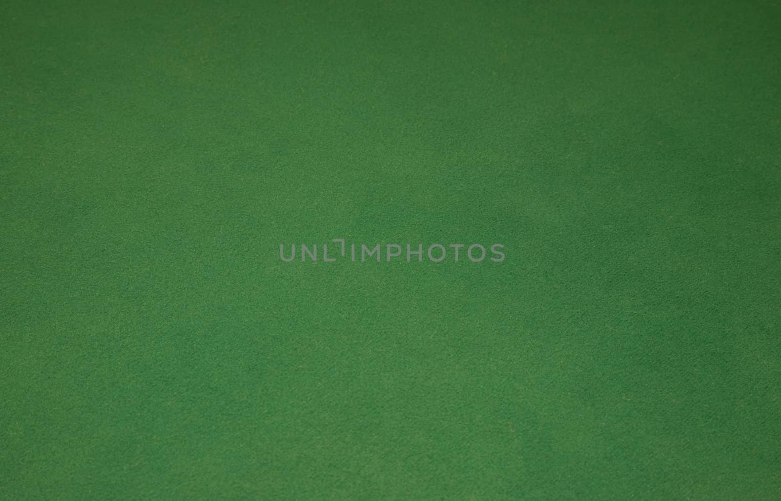 Green background from casino cloth from table