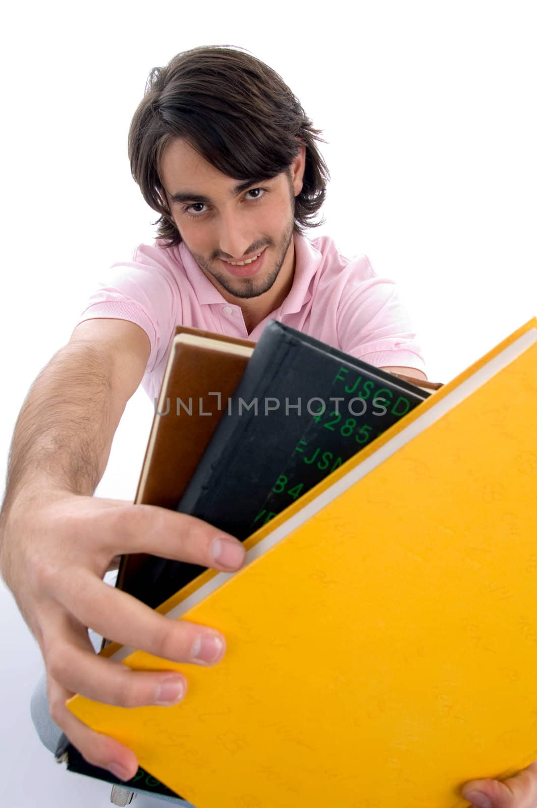 smiling male showing books with white background