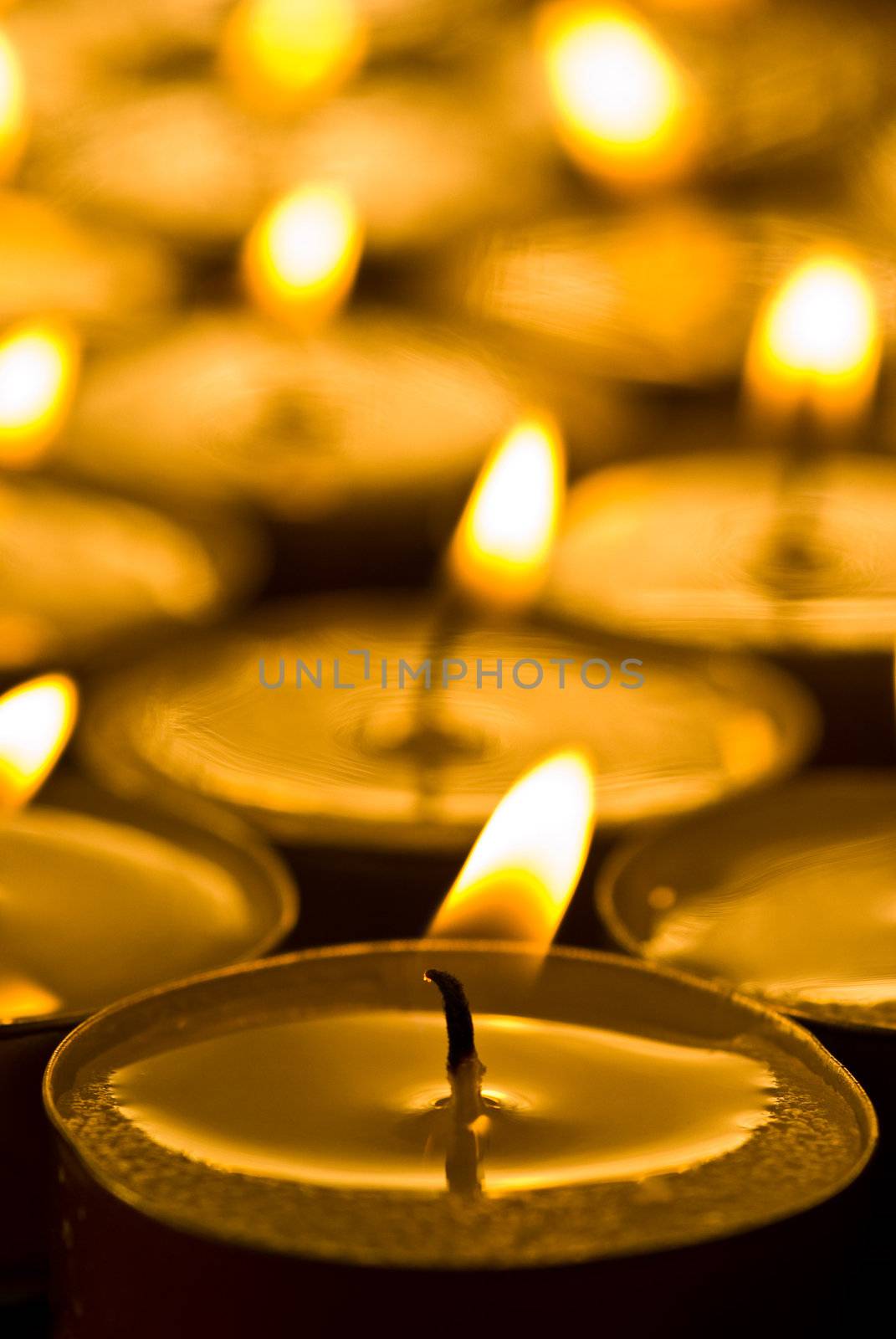 Golden warm candles by pmisak