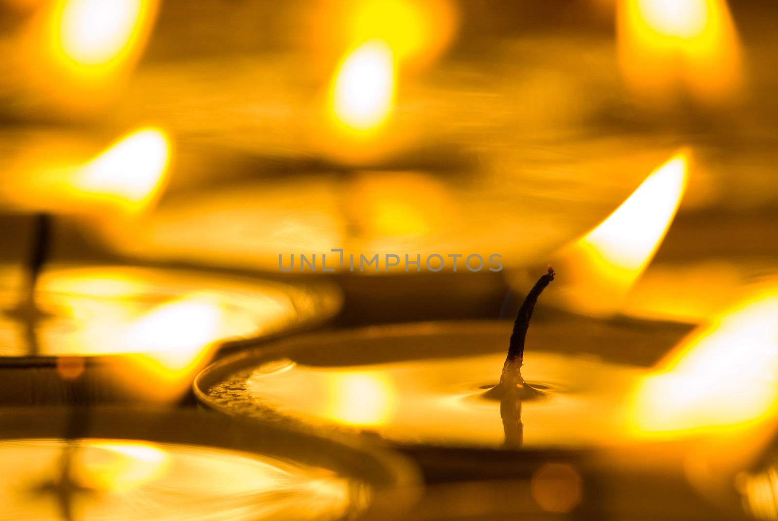 Closeup of group of burned candles