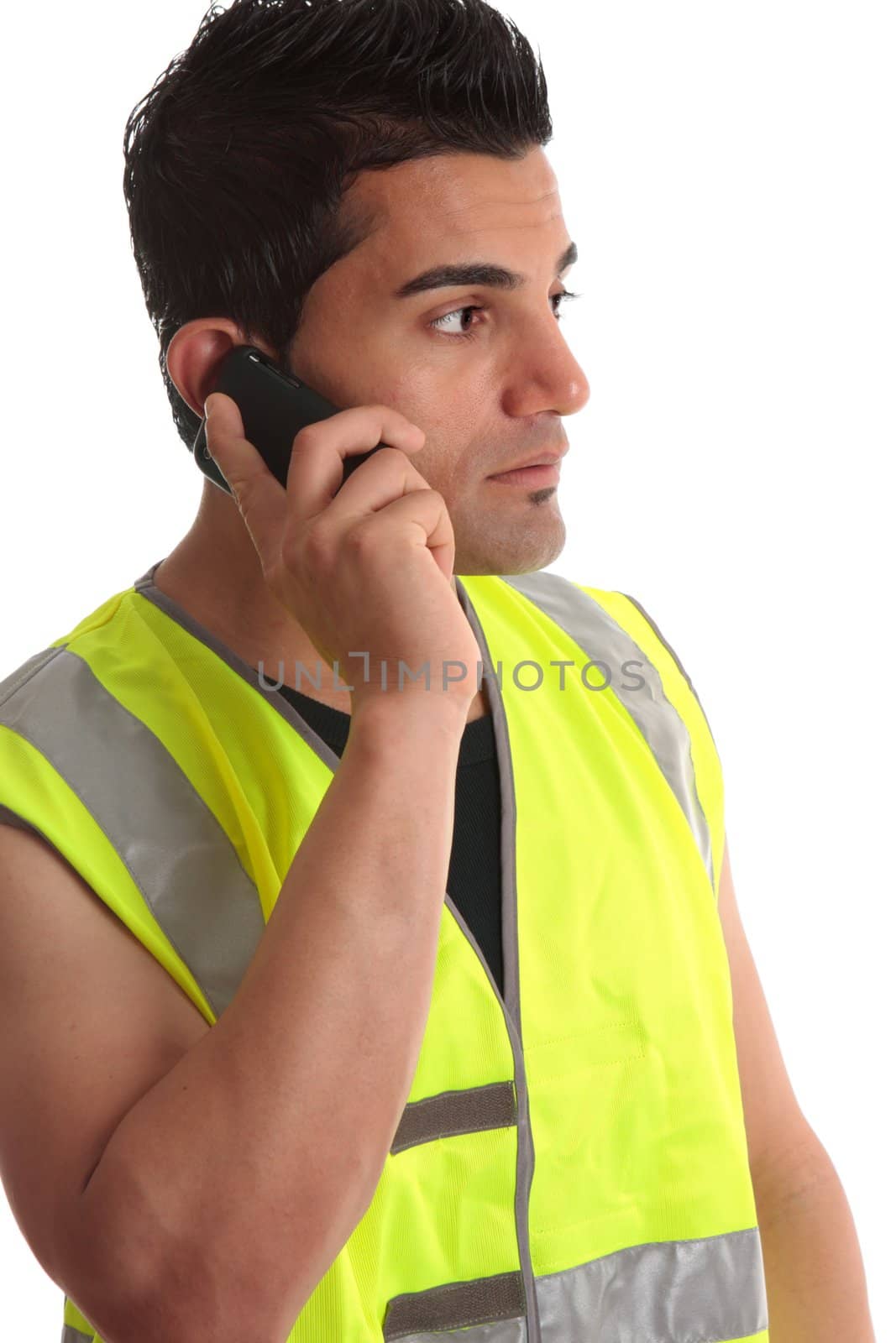 Tradesman, handyman, builder on cell phone and looking sideways, suitable for a message.  White background.