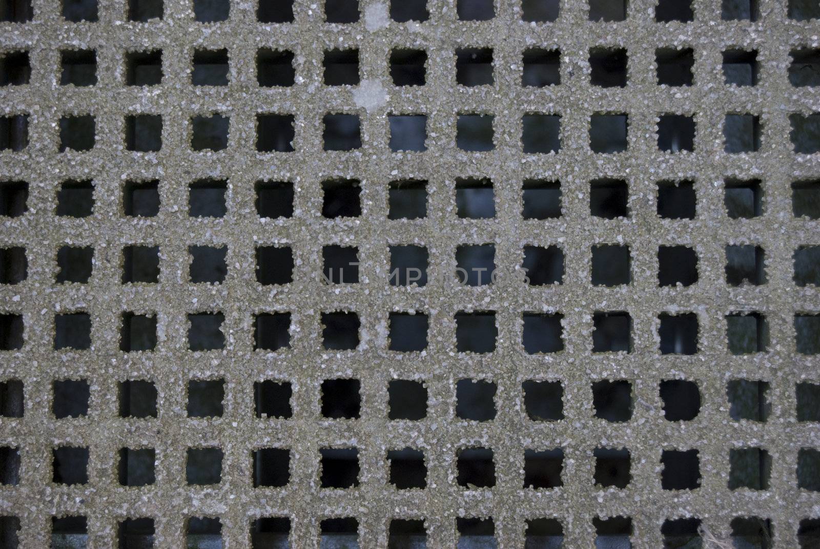 part of a grey and dirty grid 