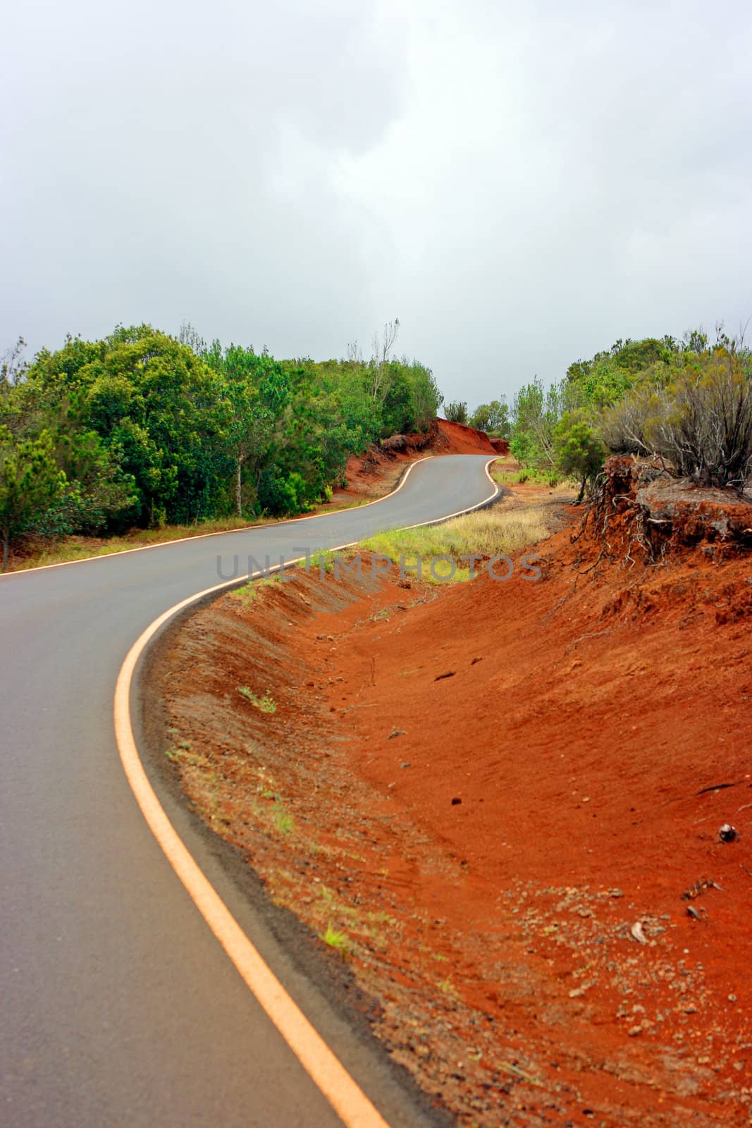 Gravel road waving across the mountains