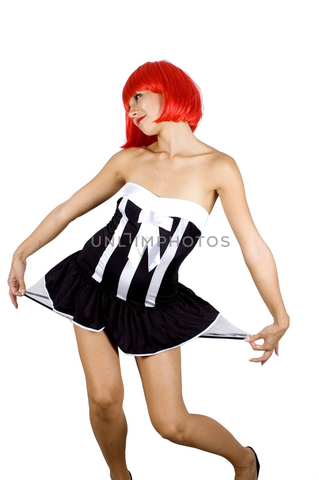 Red hair girl. Young, pretty female model. Naughty behaviour, wearing black skirt.