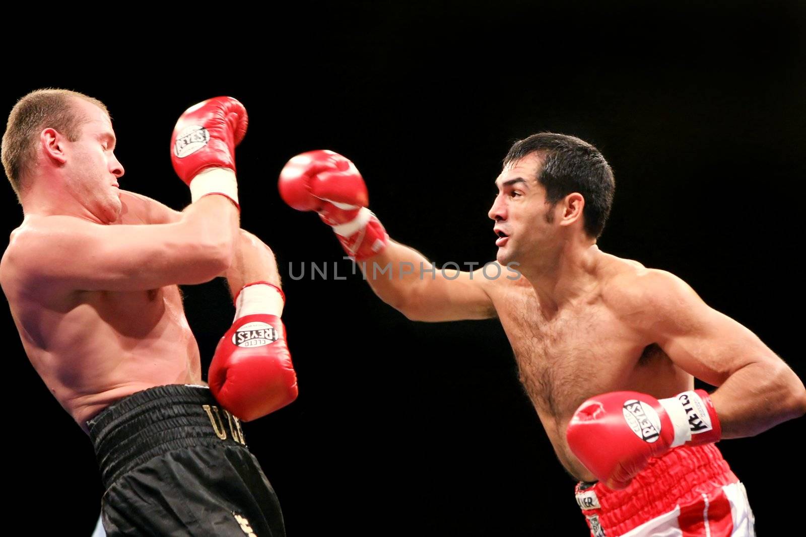  Argentinean Julio Cesar Dominguez (18-4-1, 12 KOs) is on the attack against defending WBA #8 light heavyweighter Vyacheslav Uzelkov (18-0, 11 KOs)  during their bout for the WBA light heavyweight Intercontinental Champion title at the Sports Palace Thursday, Feb 21, 2008 in Kyiv.