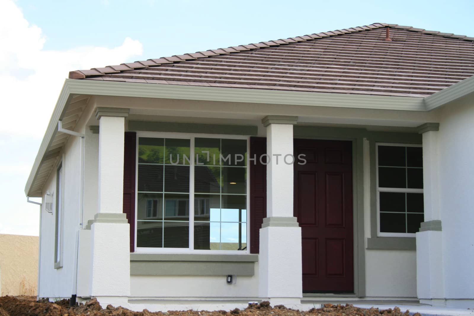 Close up of a house under construction.
