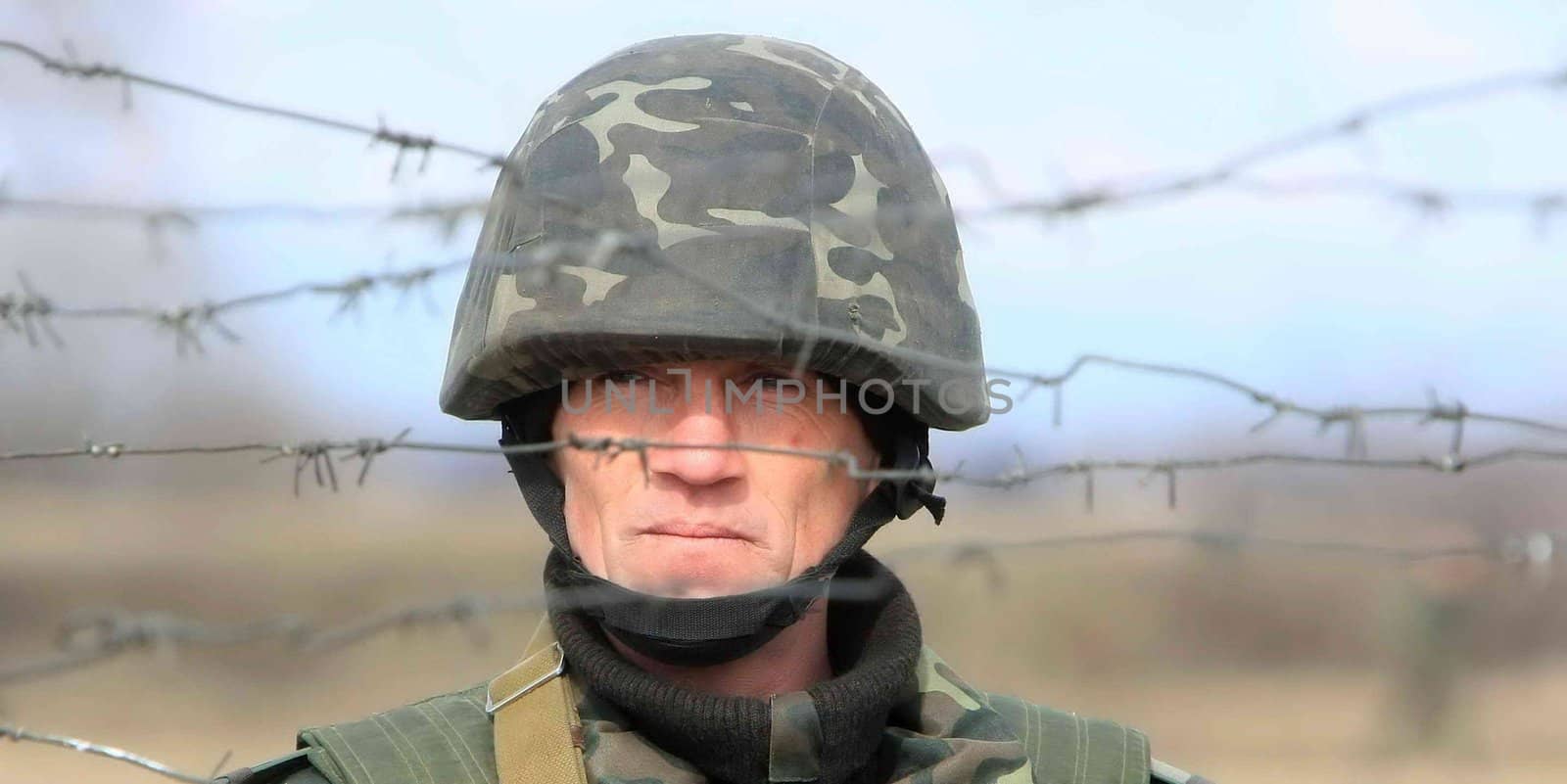 Soldier of UkrPolBat Ukrainian-Polish battalion peacekeeper during the military exercises in Velykopolovetsk combined arms training area in Kyiv March 13, 2008. Ukraine