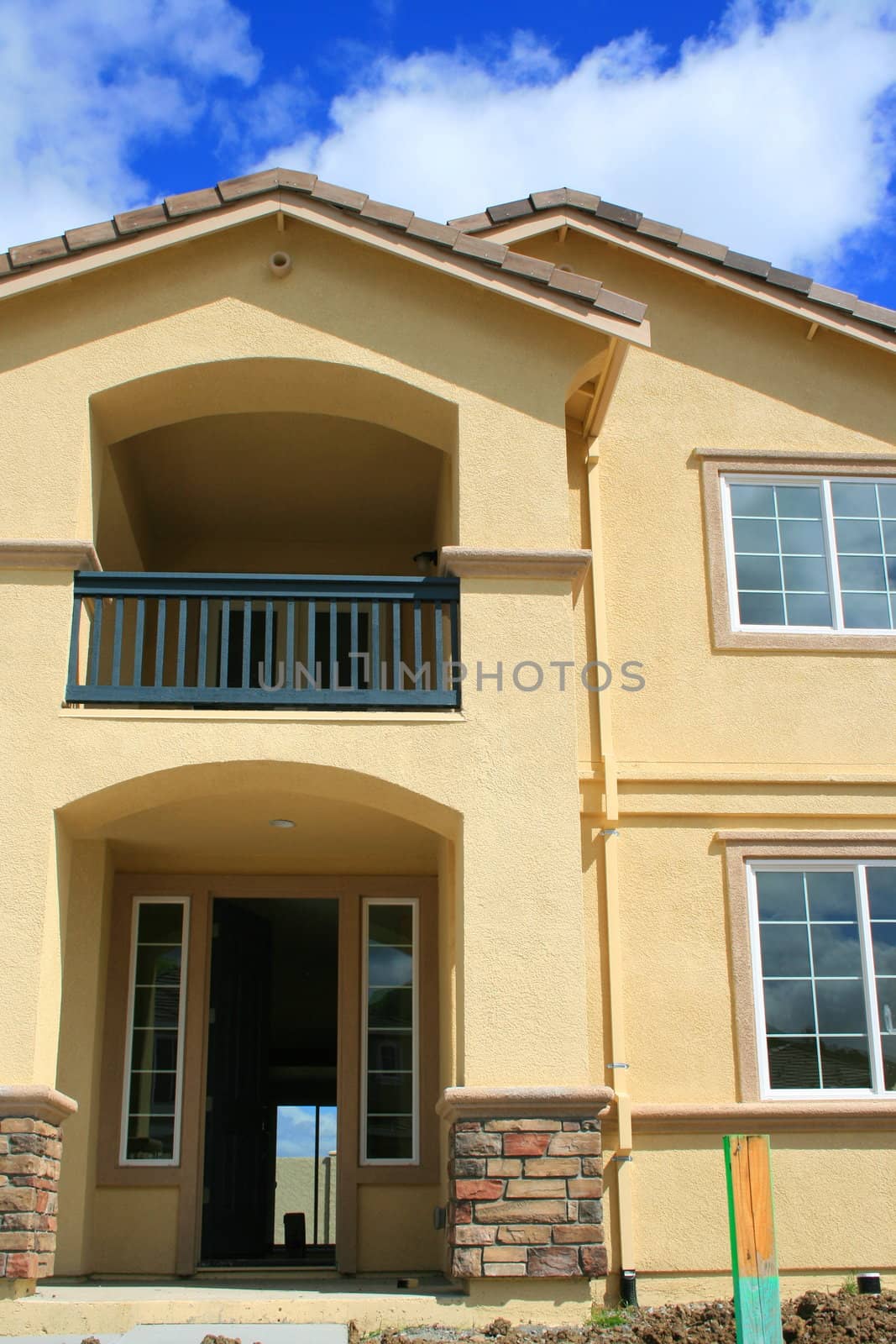 Close up of a house under construction.
