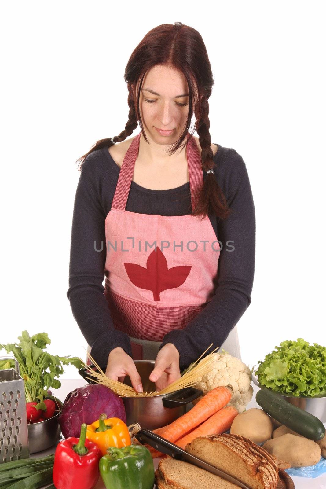 beautiful housewife preparing with 
diversity a food